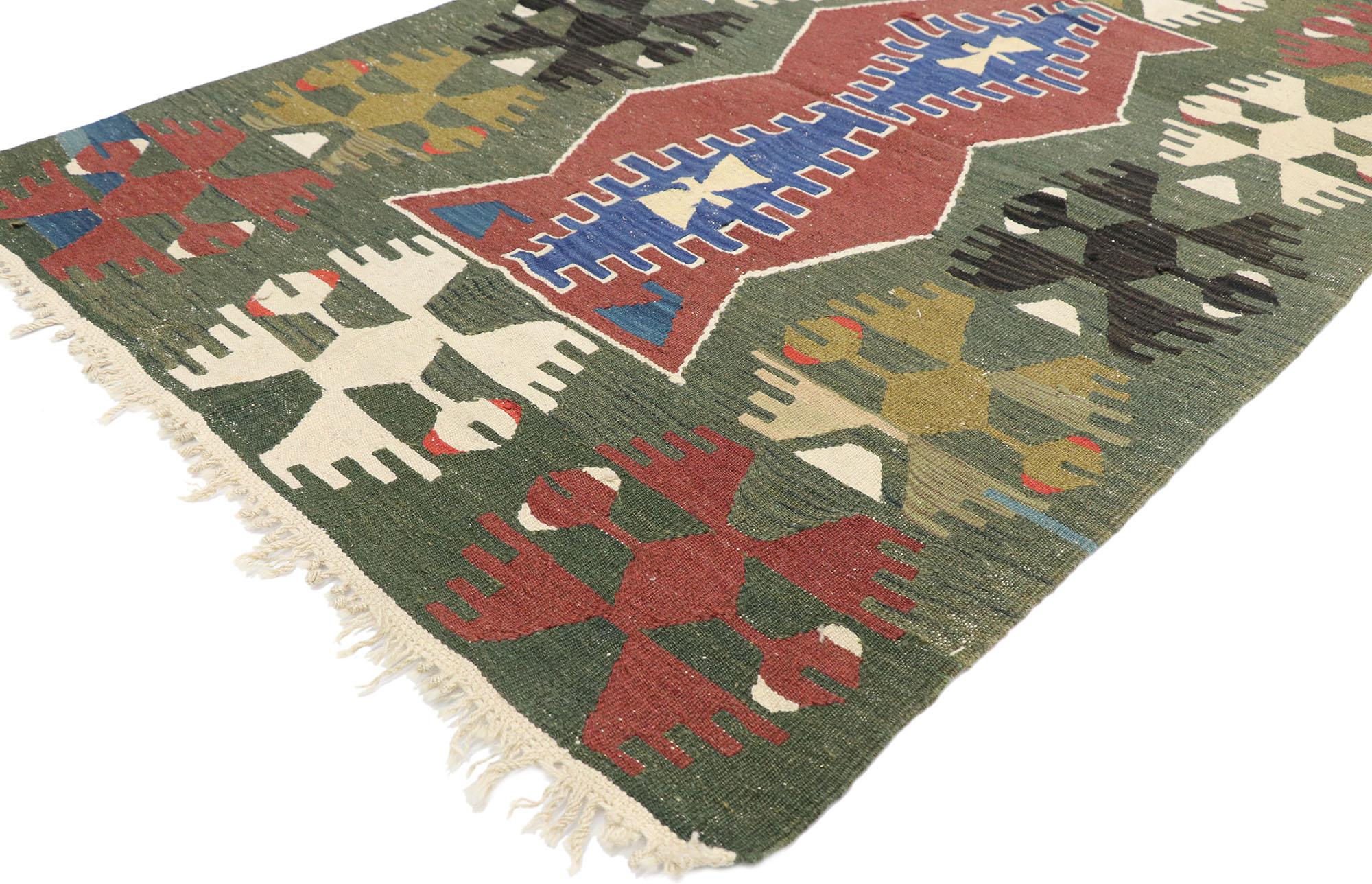77821, vintage Persian Shiraz Kilim rug with Tribal style. Full of tiny details and a bold expressive design combined with tribal style, this hand-woven wool vintage Persian Shiraz kilim rug is a captivating vision of woven beauty. The abrashed