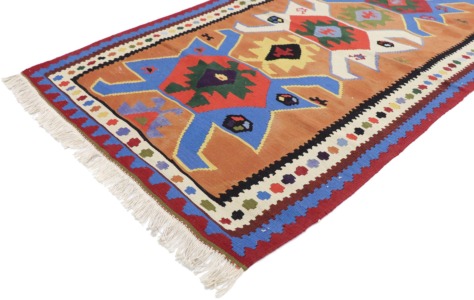 77820, vintage Persian Shiraz Kilim rug with Tribal style. With its bold expressive design, incredible detail and texture, this hand-woven wool vintage Persian Shiraz Kilim rug is a captivating vision of woven beauty. The abrashed brown field