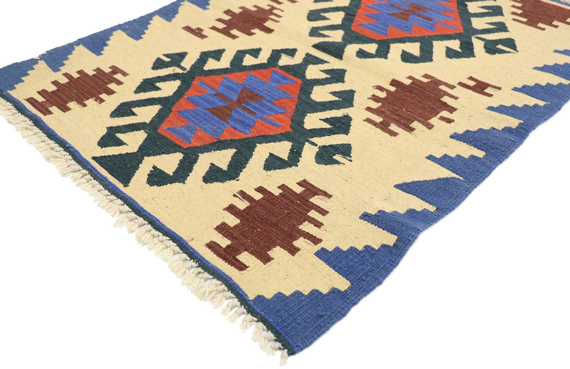 77915, vintage Persian Shiraz Kilim rug with Tribal style. Full of tiny details and a bold expressive design combined with vibrant colors and tribal style, this hand-woven wool vintage Persian Shiraz kilim rug is a captivating vision of woven