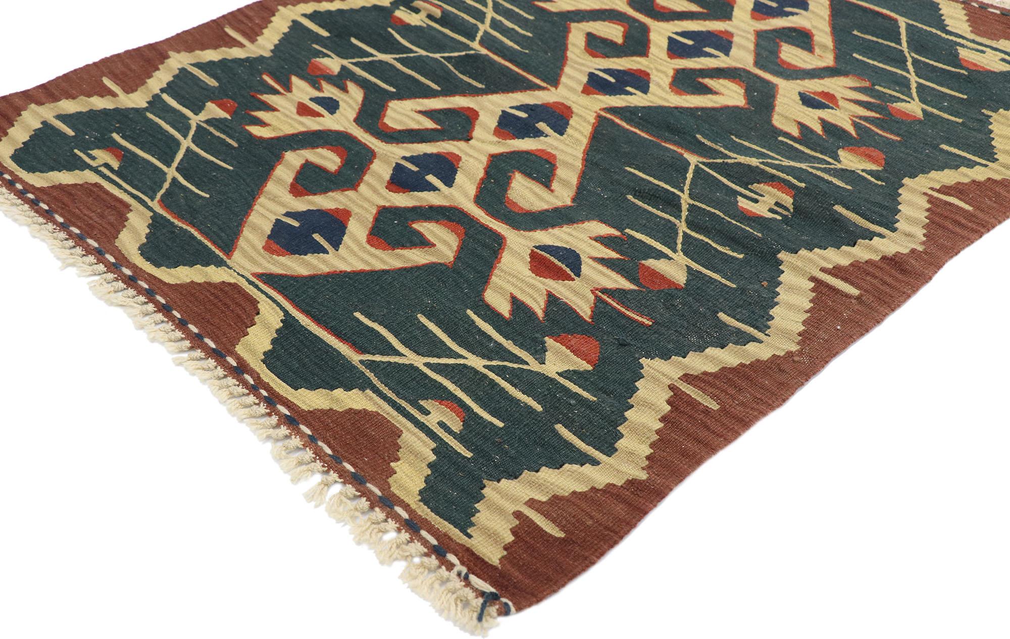 77851, vintage Persian Shiraz Kilim rug with Tribal style. Full of tiny details and a bold expressive design combined with vibrant colors and tribal style, this hand-woven wool vintage Persian Shiraz kilim rug is a captivating vision of woven