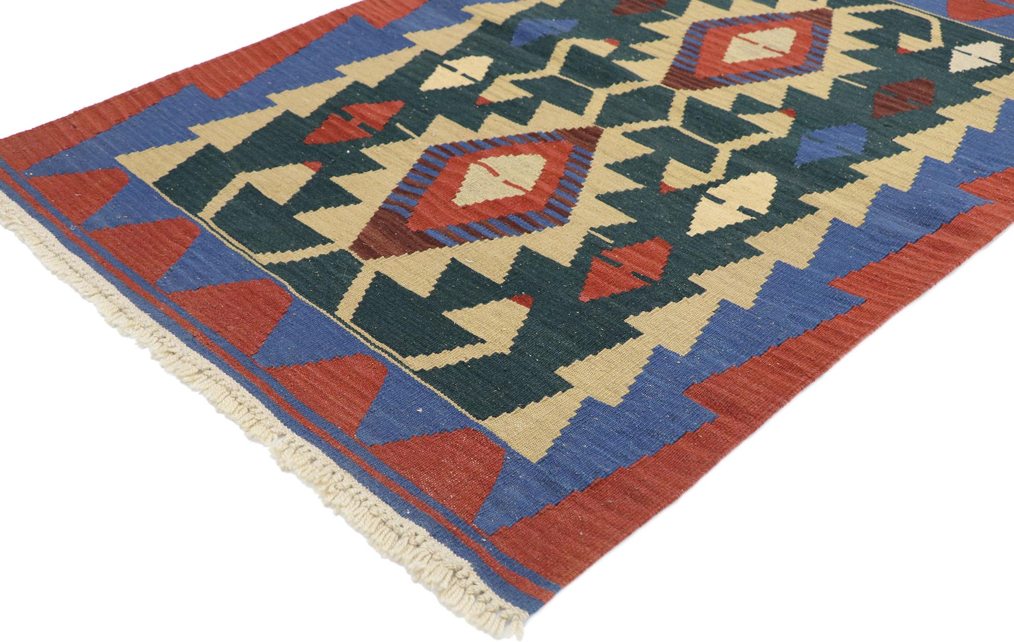 77848, vintage Persian Shiraz Kilim rug with Tribal style. Full of tiny details and a bold expressive design combined with vibrant colors and tribal style, this hand-woven wool vintage Persian Shiraz kilim rug is a captivating vision of woven