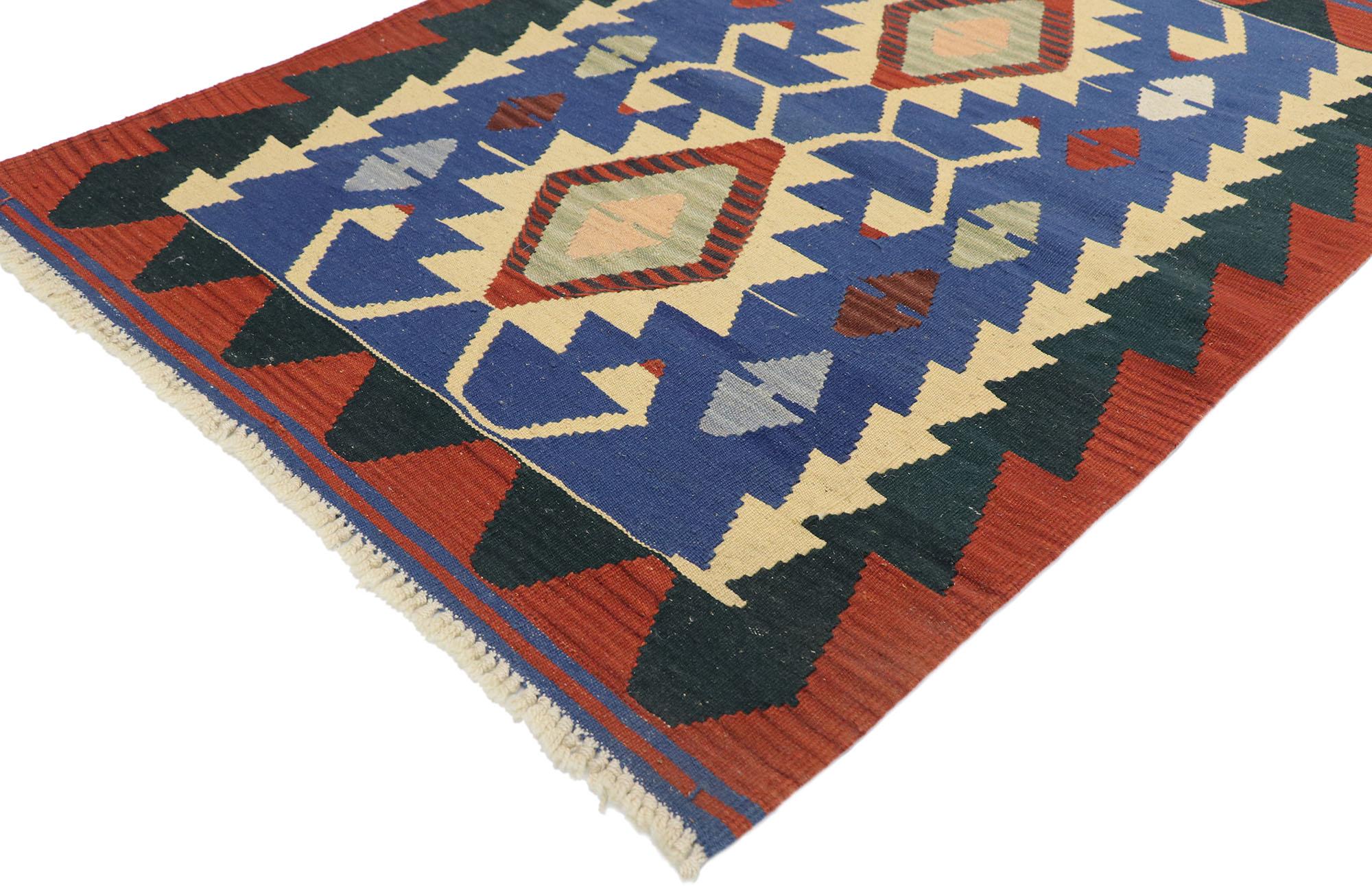 77841, vintage Persian Shiraz Kilim rug with Tribal style. Full of tiny details and a bold expressive design combined with vibrant colors and tribal style, this hand-woven wool vintage Persian Shiraz kilim rug is a captivating vision of woven