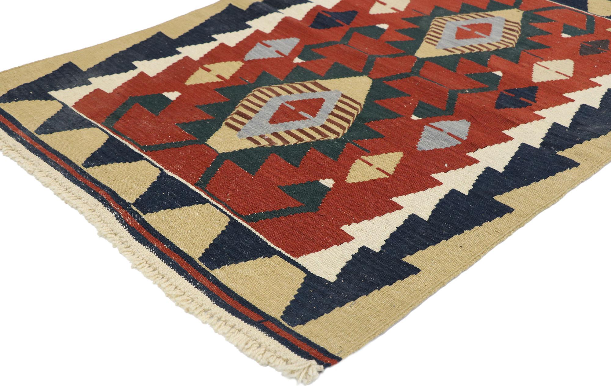 77839, vintage Persian Shiraz Kilim rug with Tribal style. Full of tiny details and a bold expressive design combined with vibrant colors and tribal style, this hand-woven wool vintage Persian Shiraz kilim rug is a captivating vision of woven