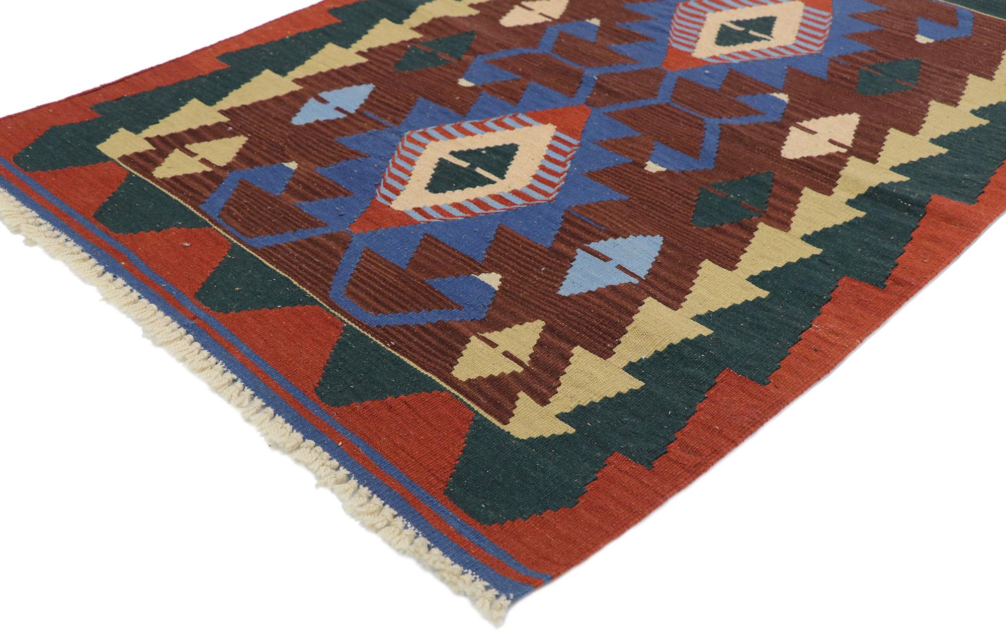 77838, vintage Persian Shiraz Kilim rug with Tribal style. Full of tiny details and a bold expressive design combined with vibrant colors and tribal style, this hand-woven wool vintage Persian Shiraz kilim rug is a captivating vision of woven