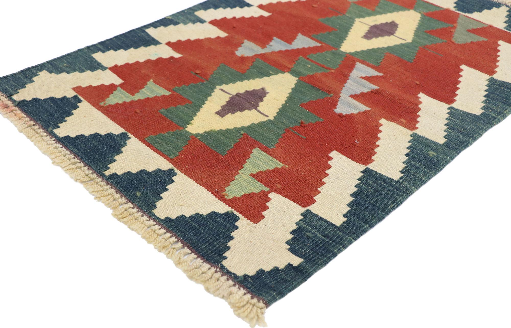 77879, Vintage Persian Shiraz Kilim rug with Tribal Style 02'00 x 02'11. Full of tiny details and a bold expressive design combined with vibrant colors and tribal style, this hand-woven wool vintage Persian Shiraz kilim rug is a captivating vision