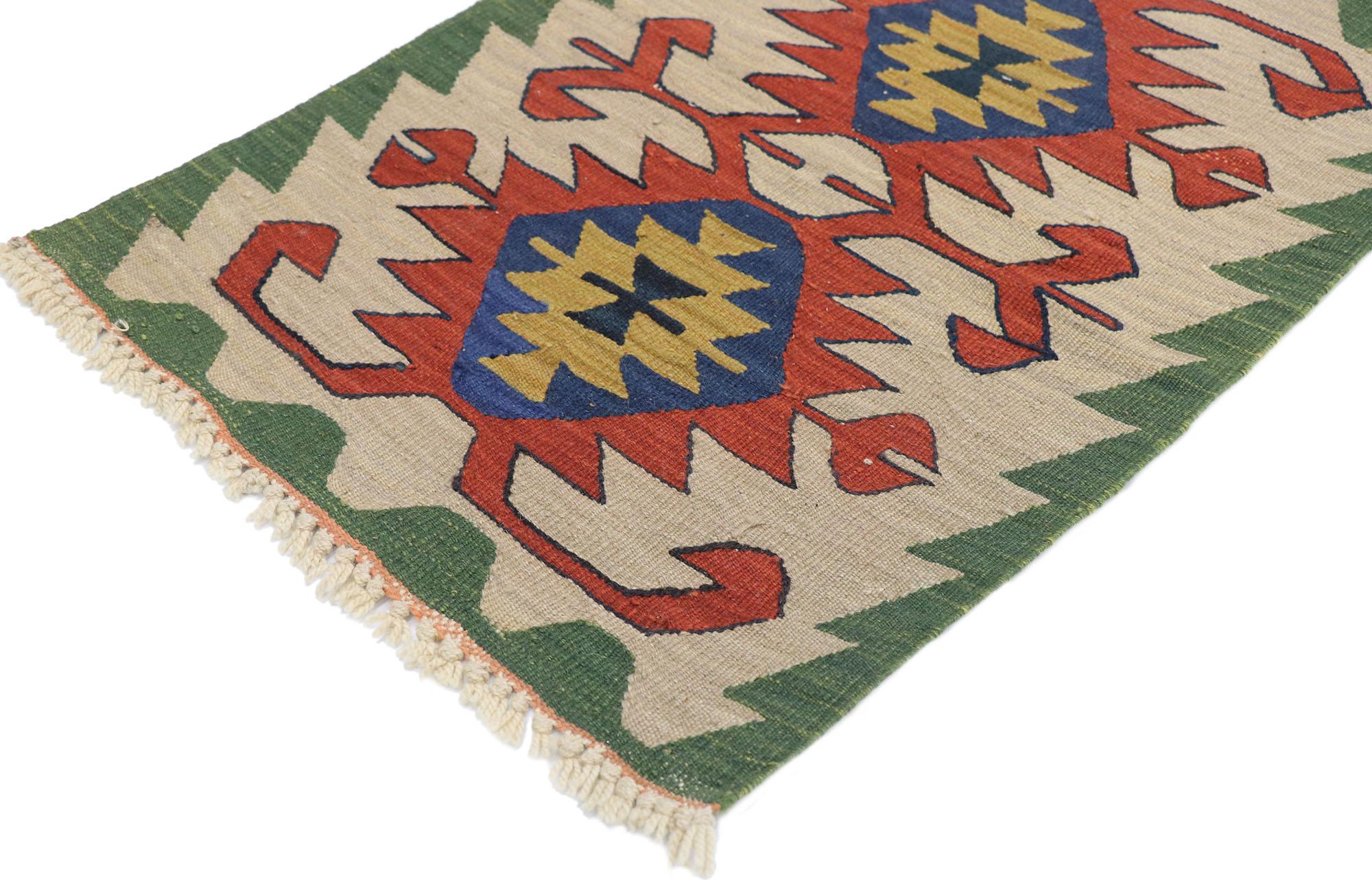 77875, Vintage Persian Shiraz Kilim rug with Tribal Style 01'10 x 02'09. Full of tiny details and a bold expressive design combined with vibrant colors and tribal style, this hand-woven wool vintage Persian Shiraz kilim rug is a captivating vision