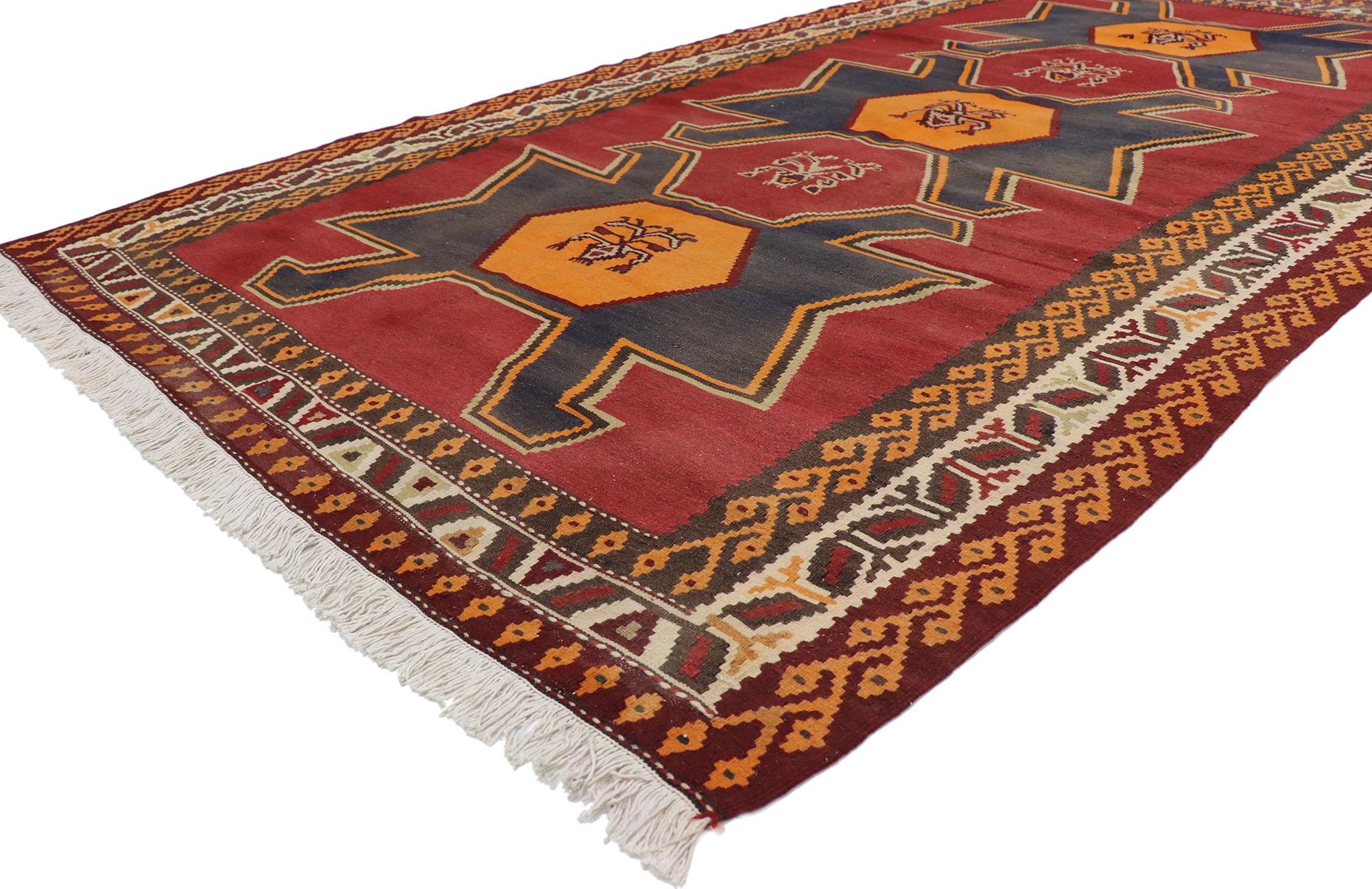 78036 Vintage Persian Shiraz Kilim rug with Tribal Style 05'06 x 09'08. Full of tiny details and a bold expressive design combined with vibrant colors and tribal style, this hand-woven wool vintage Persian Shiraz kilim rug is a captivating vision of