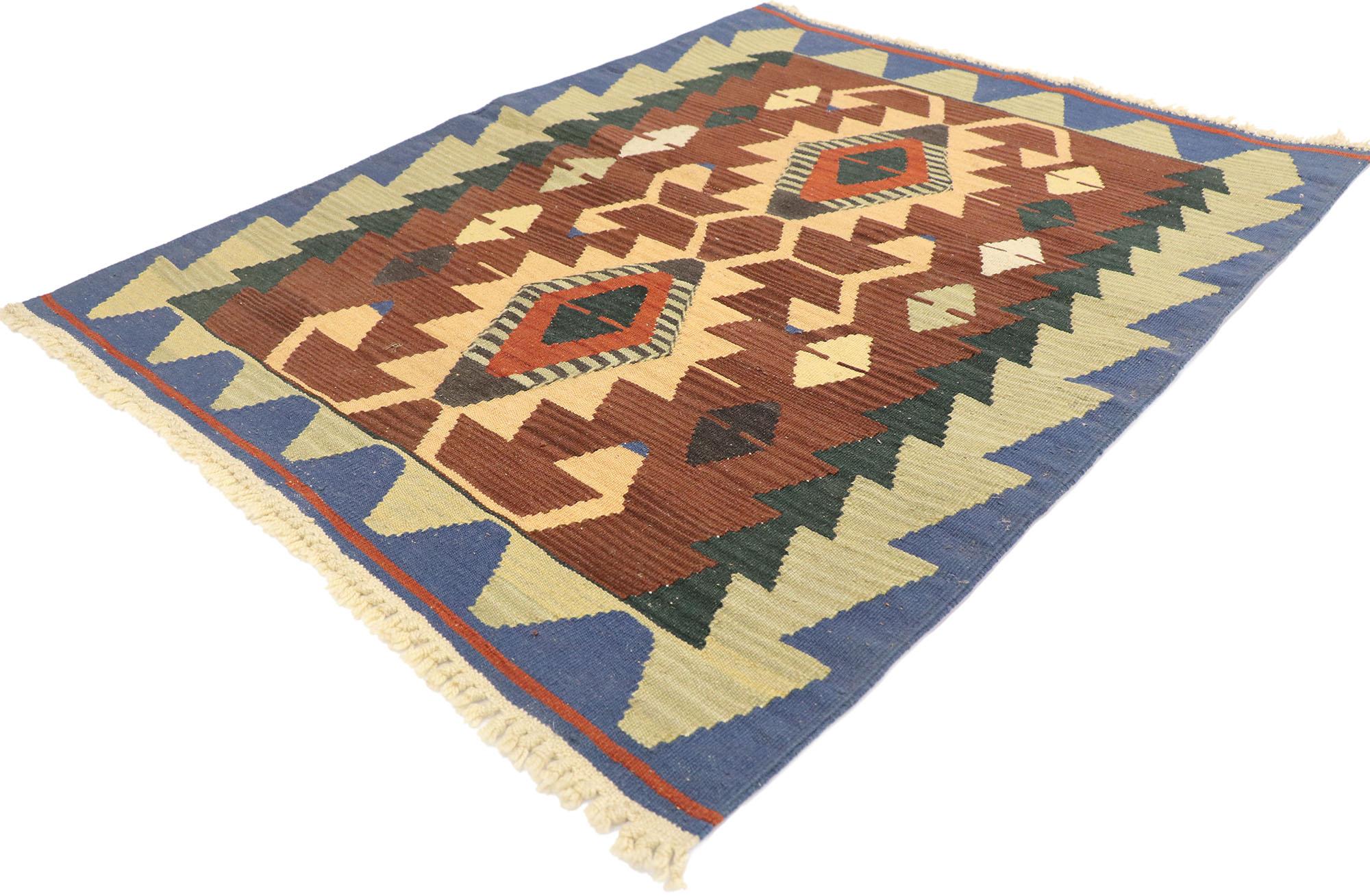 77979 Vintage Persian Shiraz Kilim rug with Tribal Style 03'02 x 03'11. Full of tiny details and a bold expressive design combined with an earthy colorway and tribal style, this hand-woven wool vintage Persian Shiraz kilim rug is a captivating