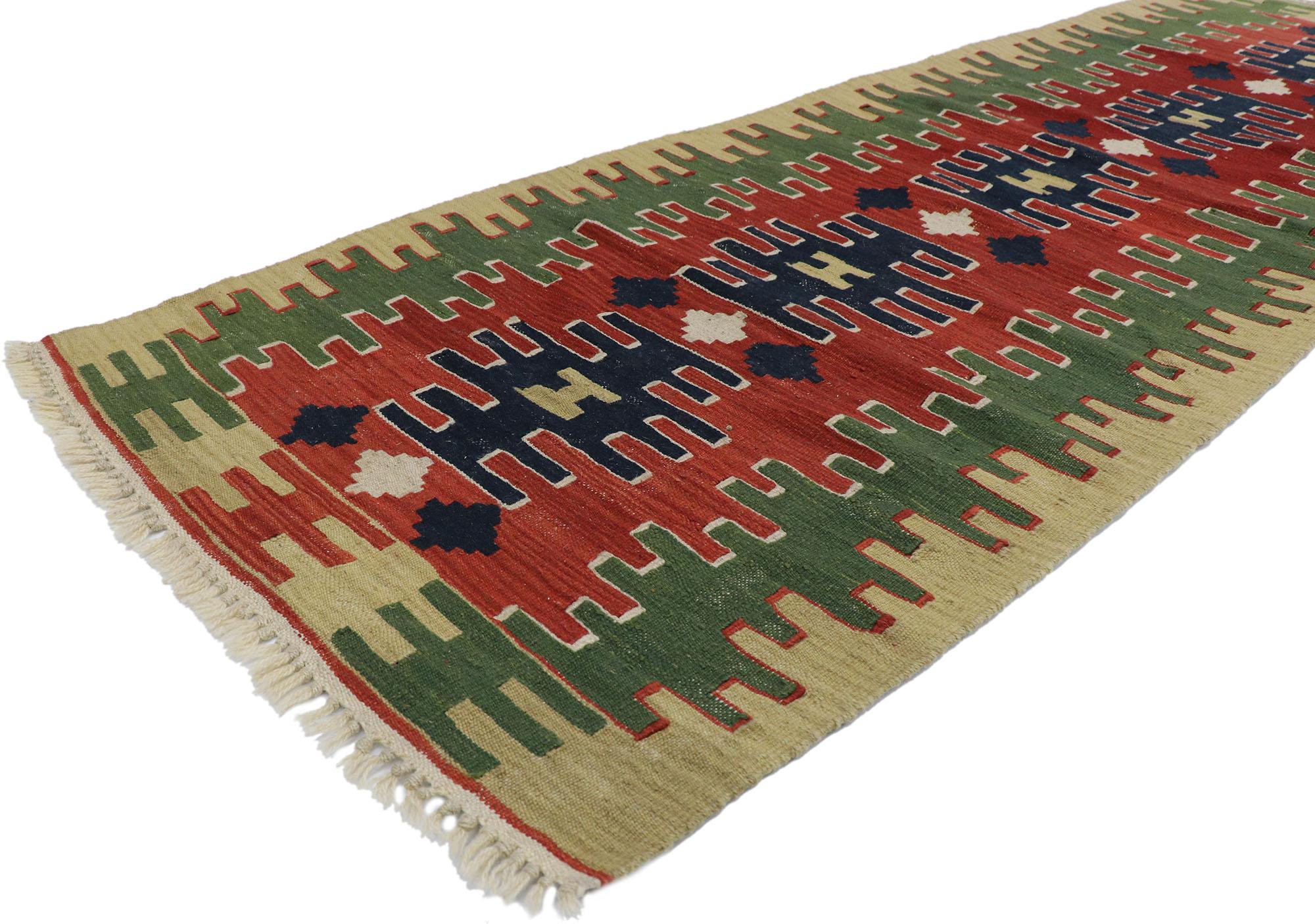 78051 Vintage Persian Shiraz Kilim runner with Tribal Style 02'07 x 07'09. Full of tiny details and a bold expressive design combined with vibrant colors and tribal style, this hand-woven wool vintage Persian Shiraz kilim runner is a captivating