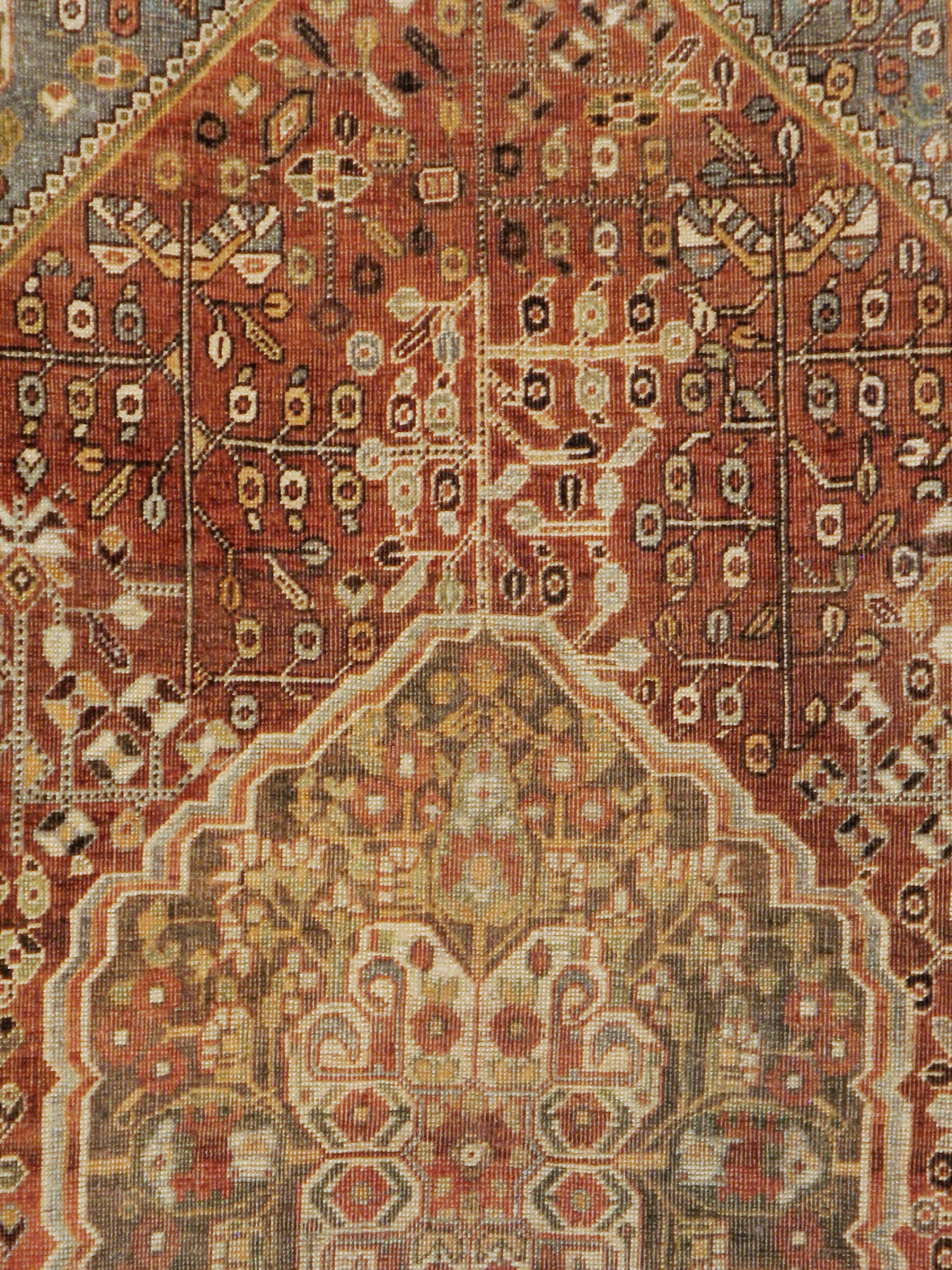 A vintage Persian Shiraz rug from the mid-20th century.

Measures: 5' 6