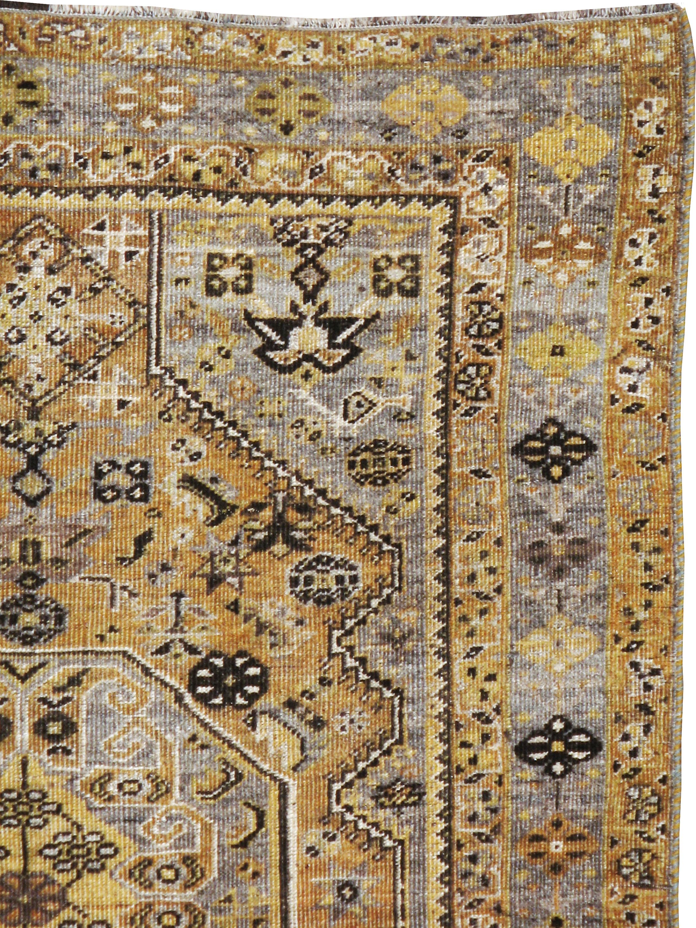 A vintage Persian Shiraz nomadic rug from the mid-20th century.