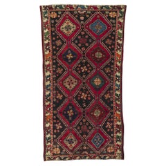 Vintage Persian Shiraz Rug, Tribal Enchantment Meets Modern Masculine Appeal