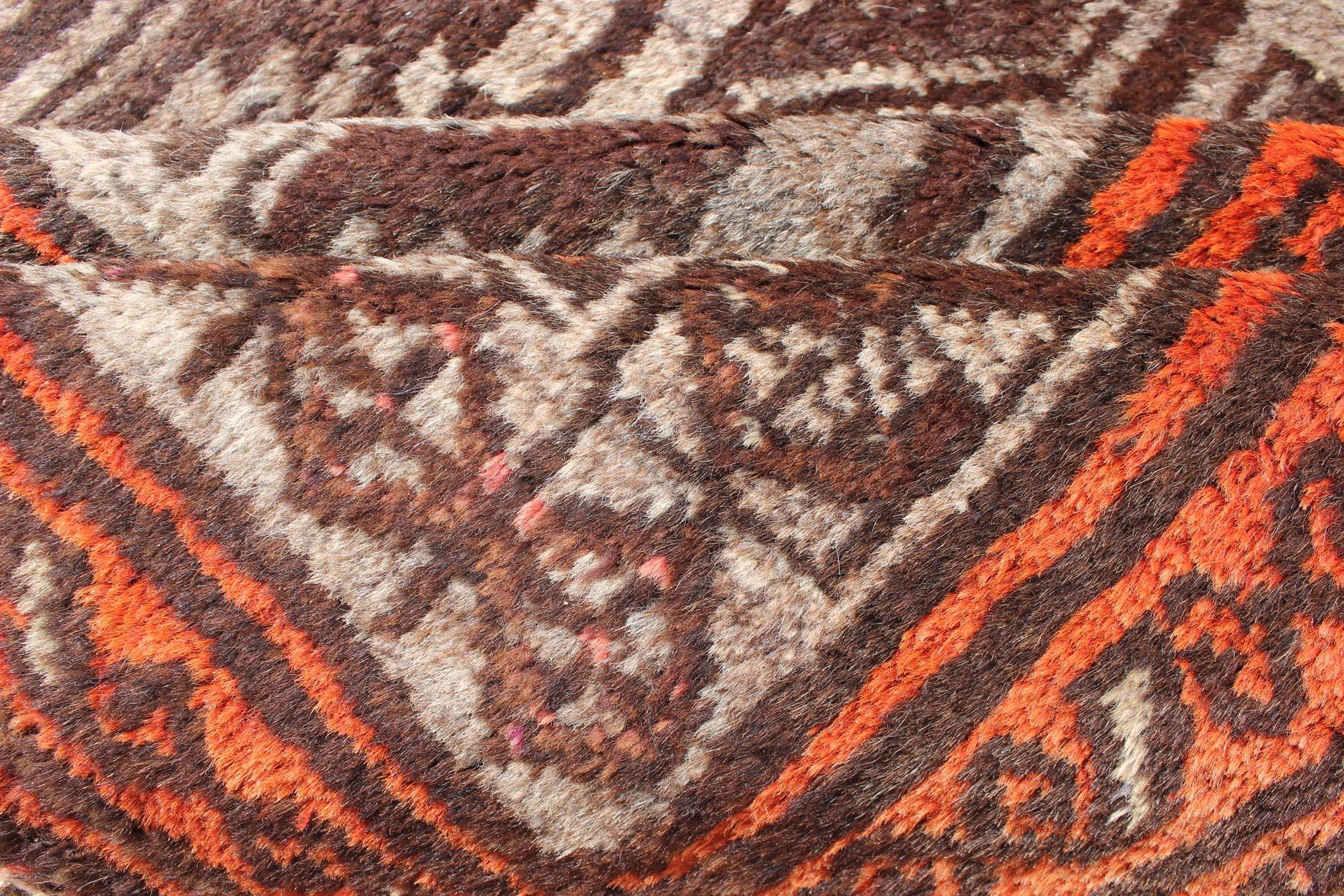 burnt orange and brown rug