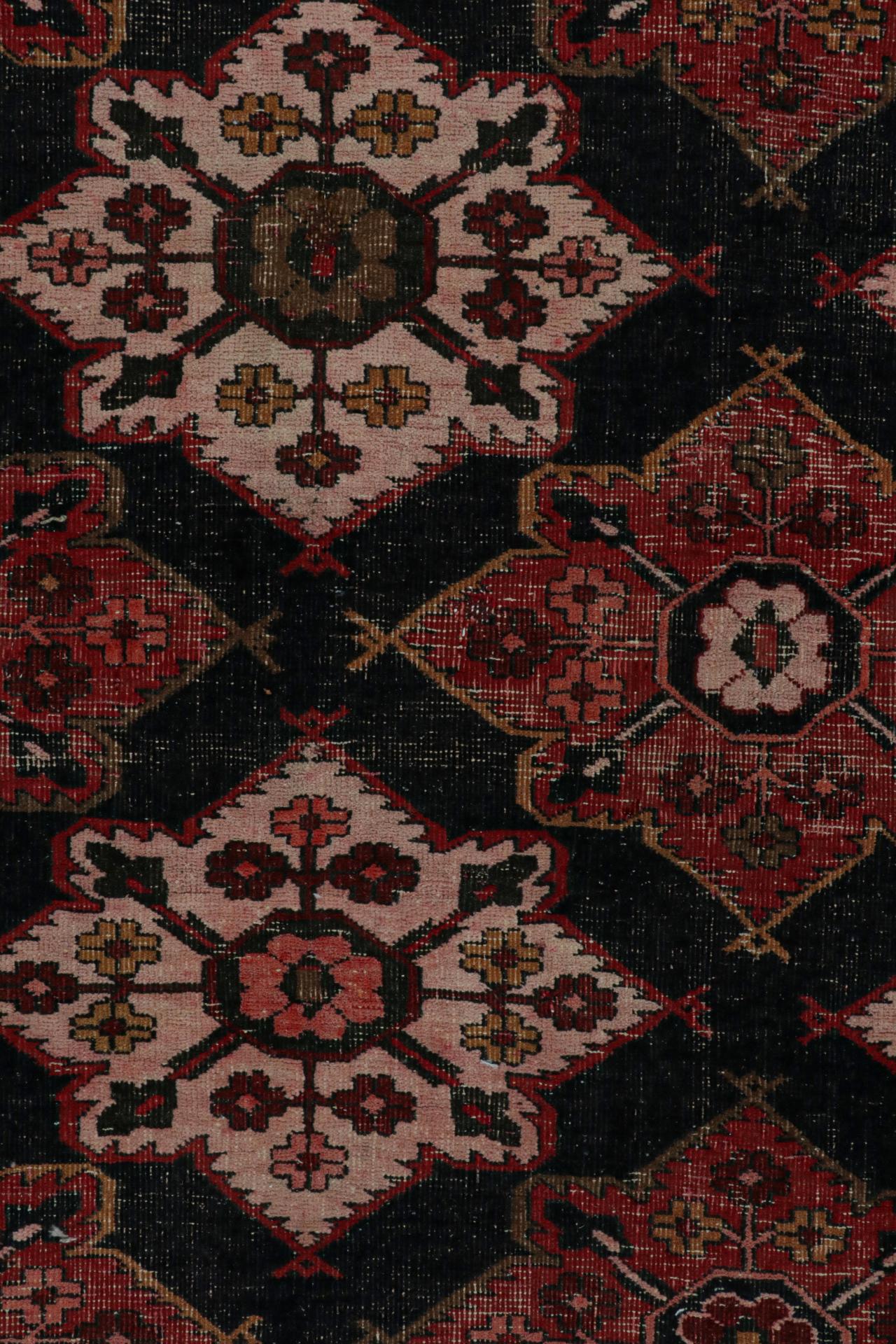 Wool Vintage Persian Shiraz rug in Red and Black Floral Patterns by Rug & Kilim For Sale