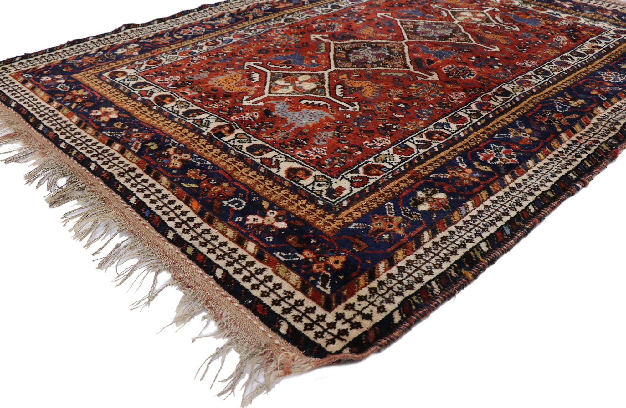 78025 vintage Persian Shiraz rug with Tribal style 04'01 x 05'07. Embodying tribal style and understated elegance with rustic sensibility, this hand knotted wool vintage Persian Shiraz rug is a captivating vision of woven beauty. A lozenge pole