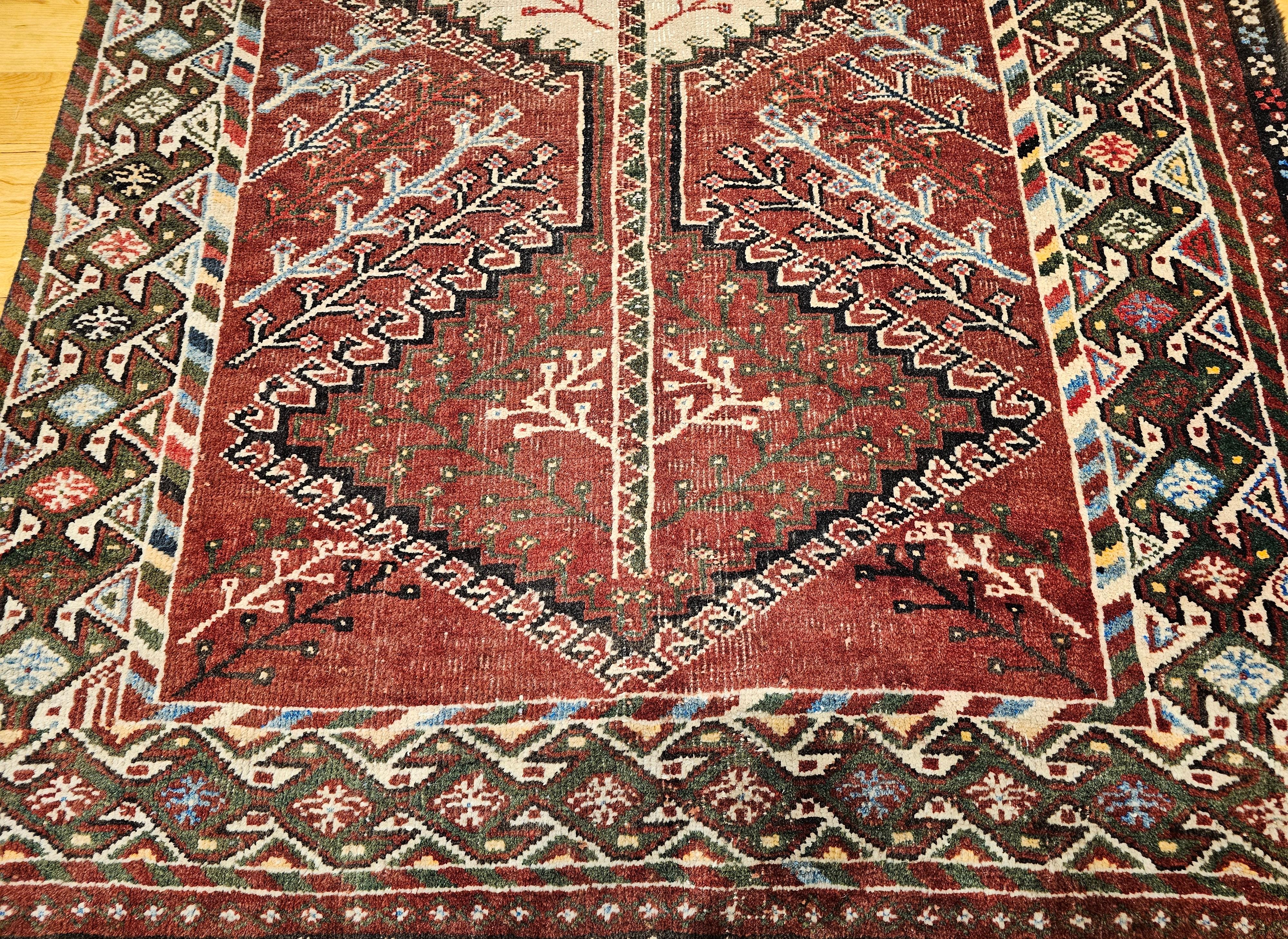 Wool Vintage Persian Shiraz Tribal Area Rug in Burgundy, Ivory, Green, Blue For Sale