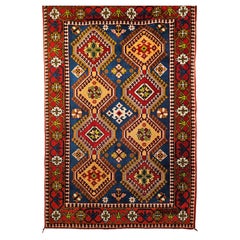 Tapis tribal persan vintage Shiraz à motif géométrique sur toute sa surface en bleu et rouge