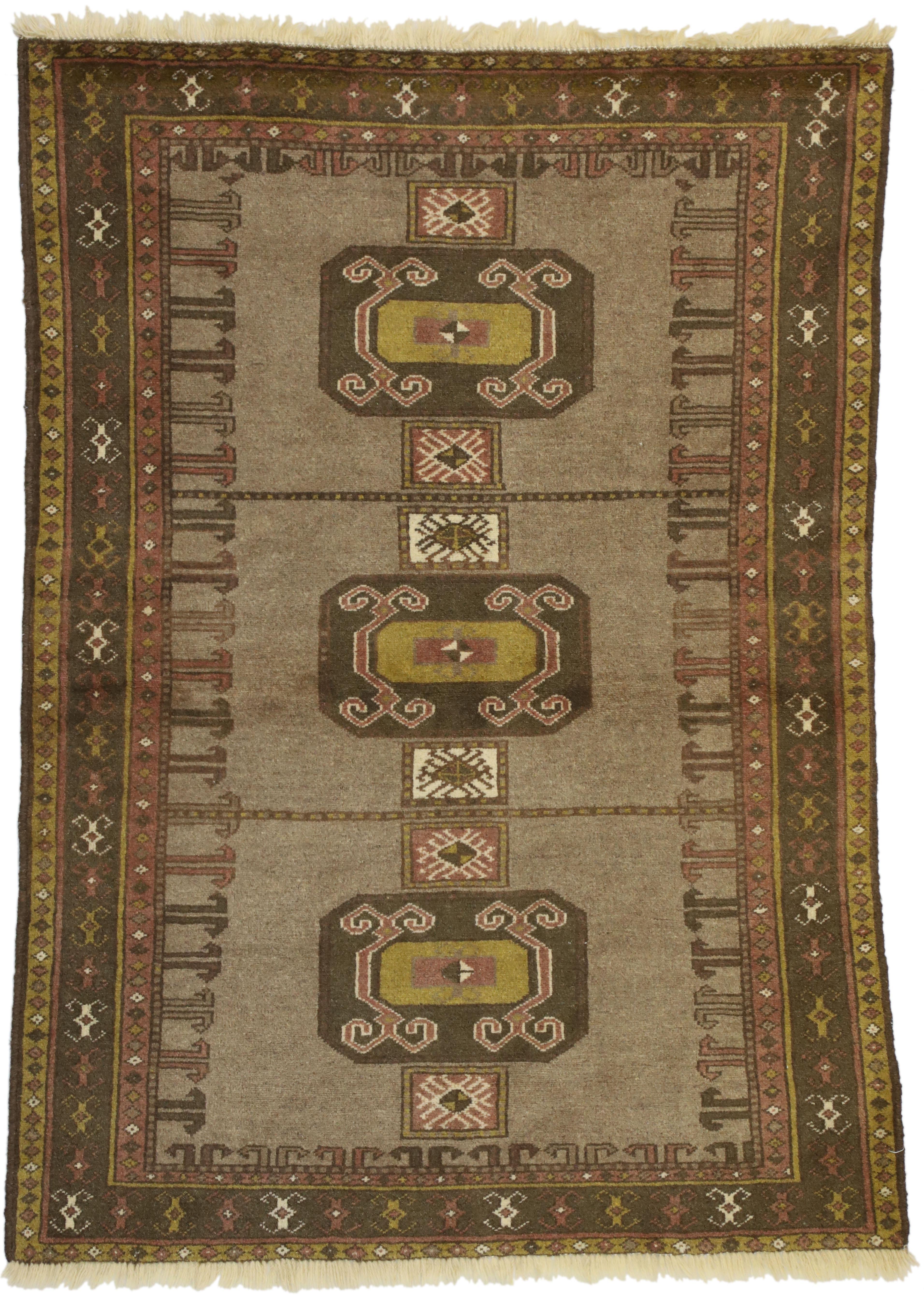 76402, Vintage Persian Shiraz Tribal Rug with Mid-Century Modern Style 04'00 x 05'06. This hand-knotted wool vintage Persian Shiraz rug with tribal style features three amulet style medallions filled with tribal motifs in an open abrashed field. It