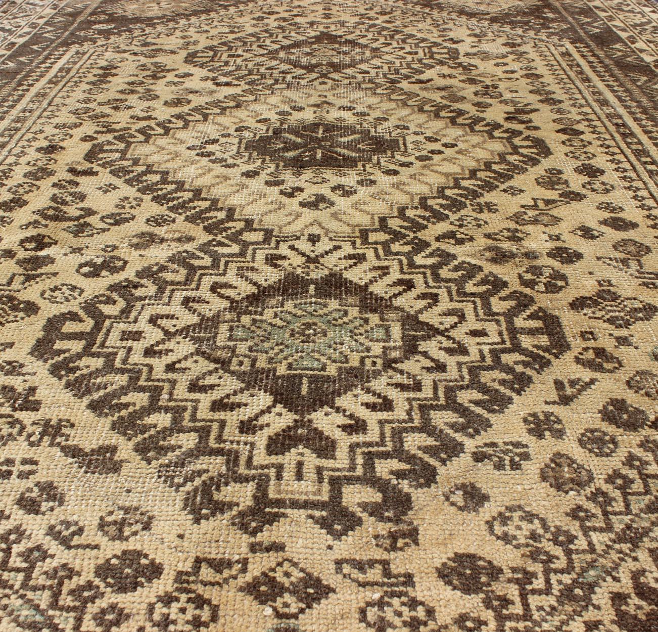 Wool Earth Tones Vintage Persian Shiraz with Tribal Design and Neutral Colors For Sale