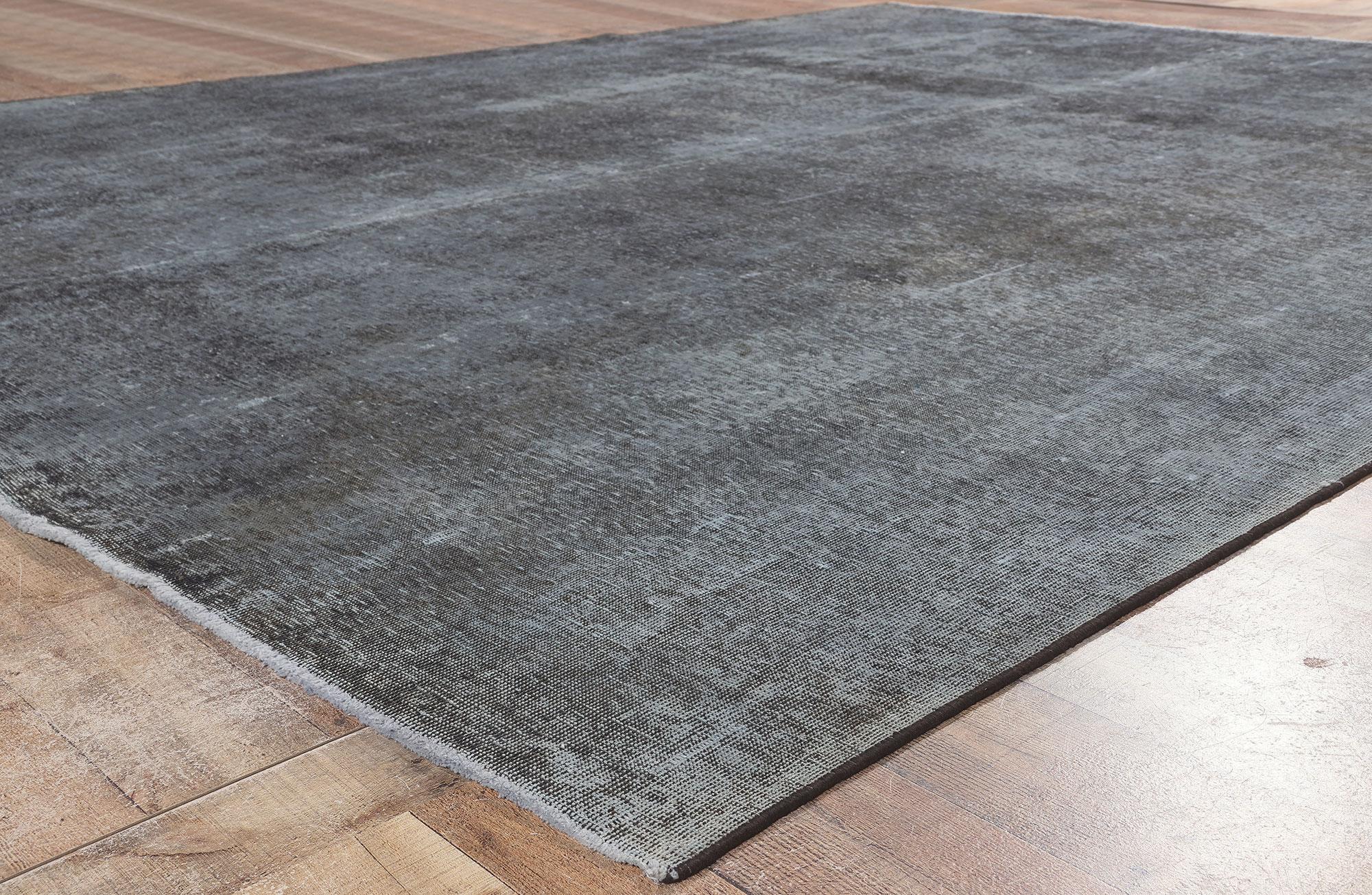 78593 Vintage Persian Slate Overdyed Rug, 10'00 x 13'06. 
Sophisticated elegance meets luxe utilitarian appeal in this vintage Persian overdyed rug. The modern industrial charm and monochromatic color planes woven into this piece work together