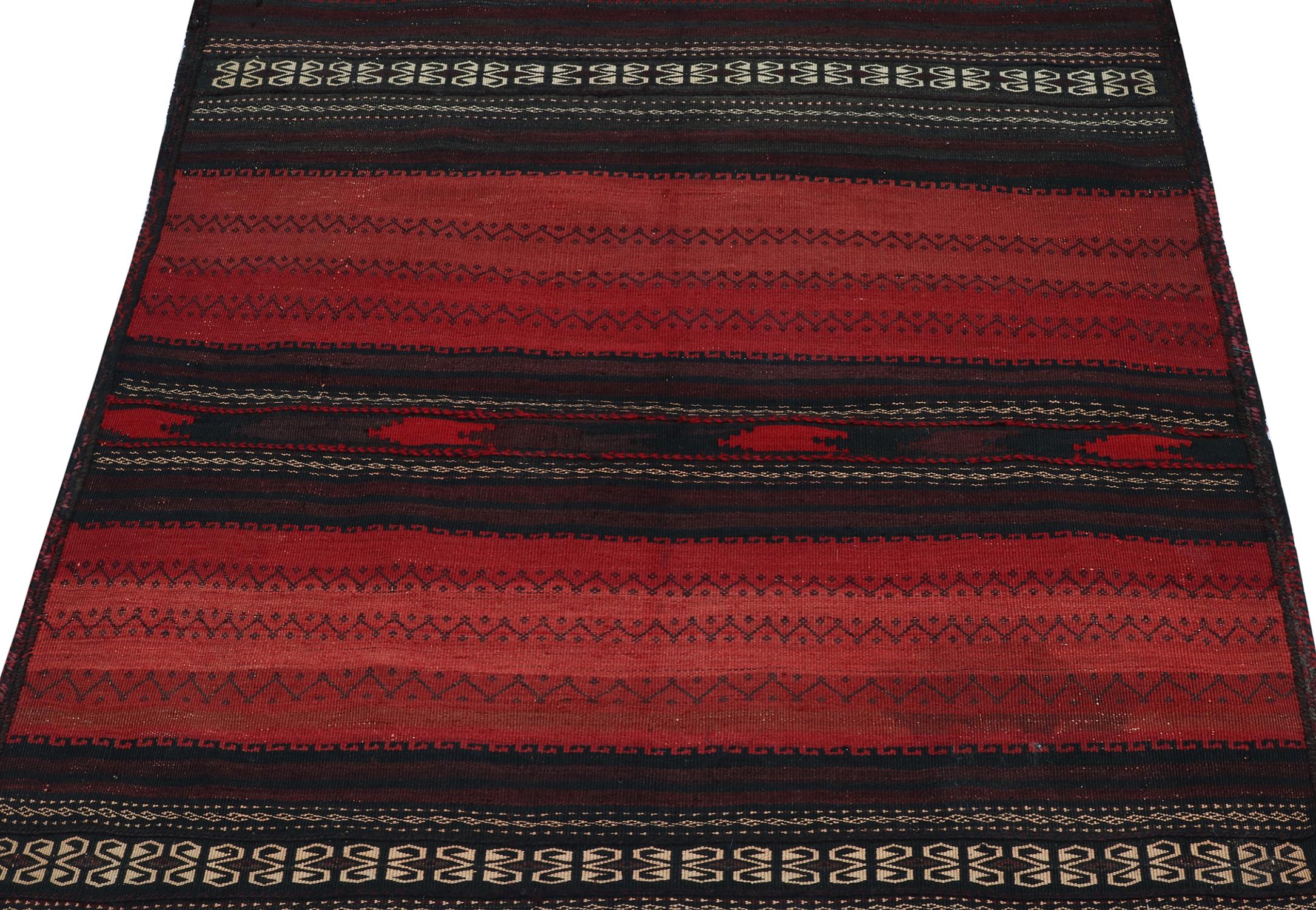 This vintage 3x3 Persian kilim is a square rug of intriguing origin—handwoven in wool circa 1960-1970.

Further on the Design:

The design may either connote a Sofreh design or a bag design that was opened into a rug. The deep color reads black and