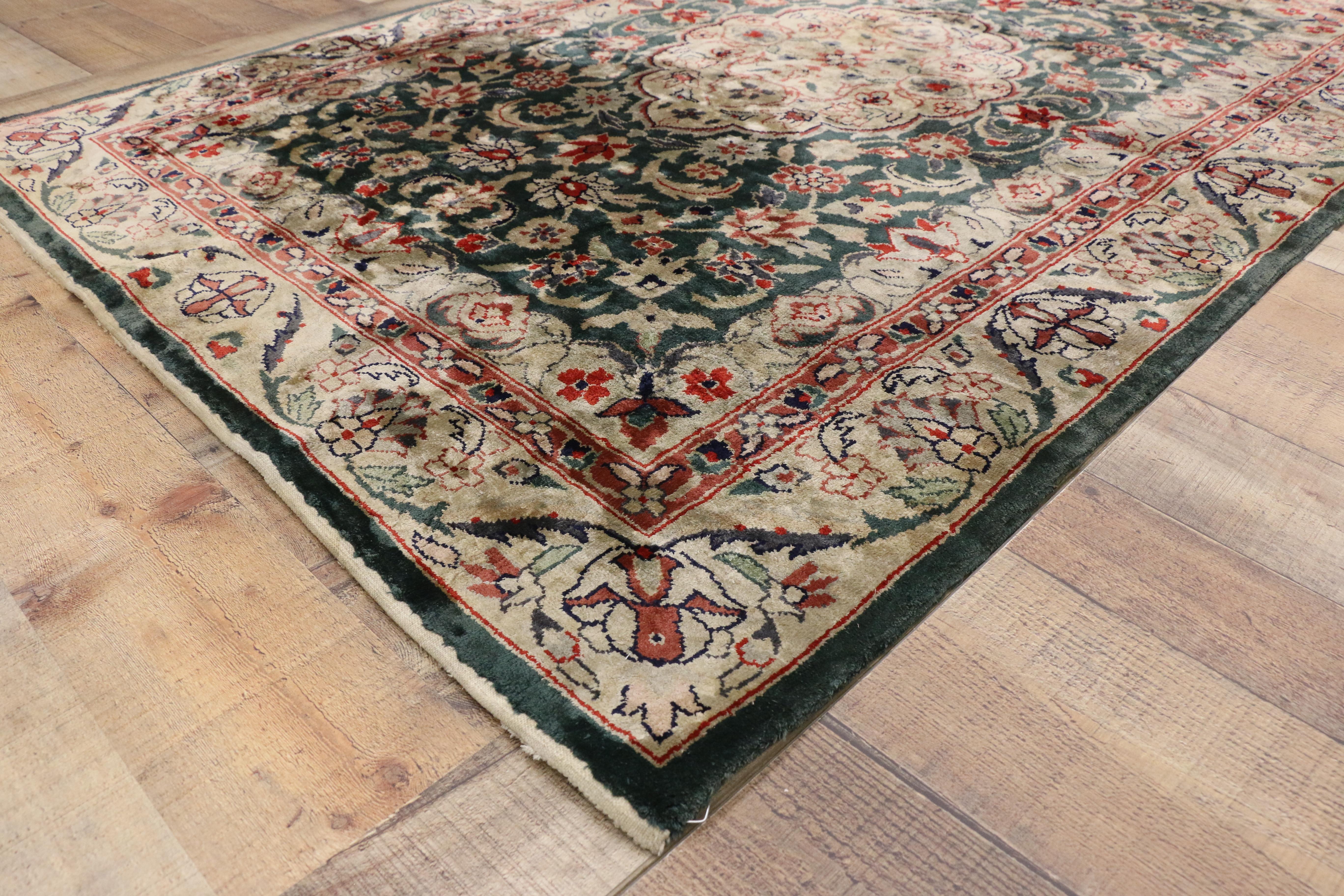 77172, vintage Persian style Chinese rug with traditional design. This Vintage Persian style chinese rug features a traditional lobed diamond medallion with elaborate floral ornament against a moss green field. Inward-facing lobed mounds extend from