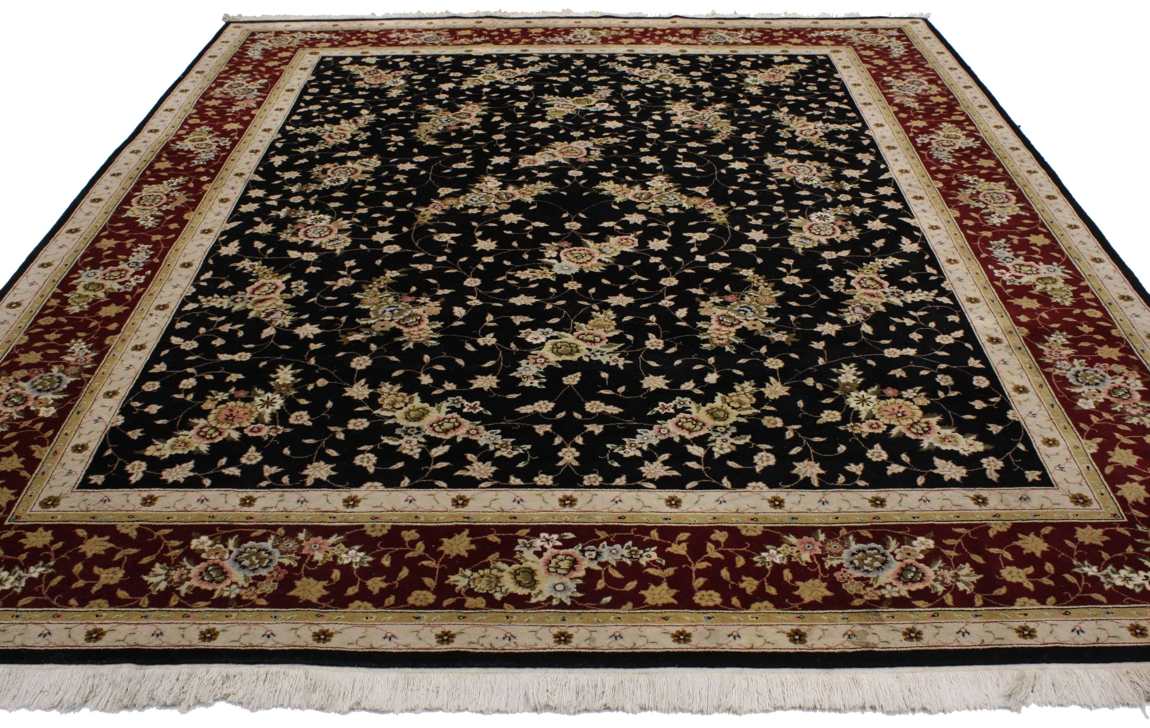 76703, vintage Persian style rug with traditional style. Opulent and whimsical, this hand knotted wool vintage Persian style rug with traditional style features an all-over floral pattern of an undulating tendril lattice against an ink black