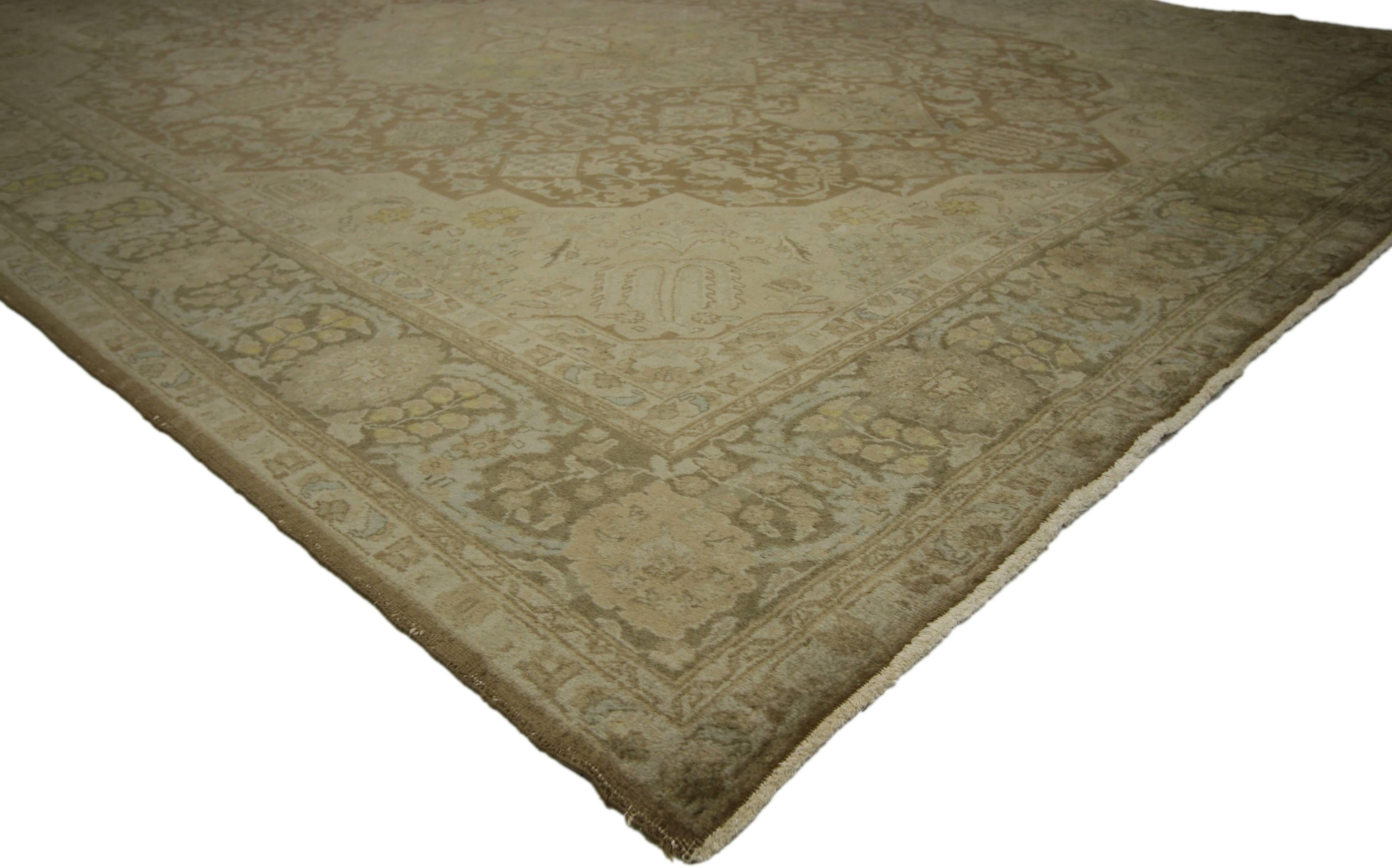 75889 Vintage Persian Tabriz Area Rug 09'09 X 13'00. Embodying the highly decorative aesthetic and neutral color palette sought by many, this hand-knotted wool Persian Tabriz highlights a visually striking composition. Featuring a stately yet