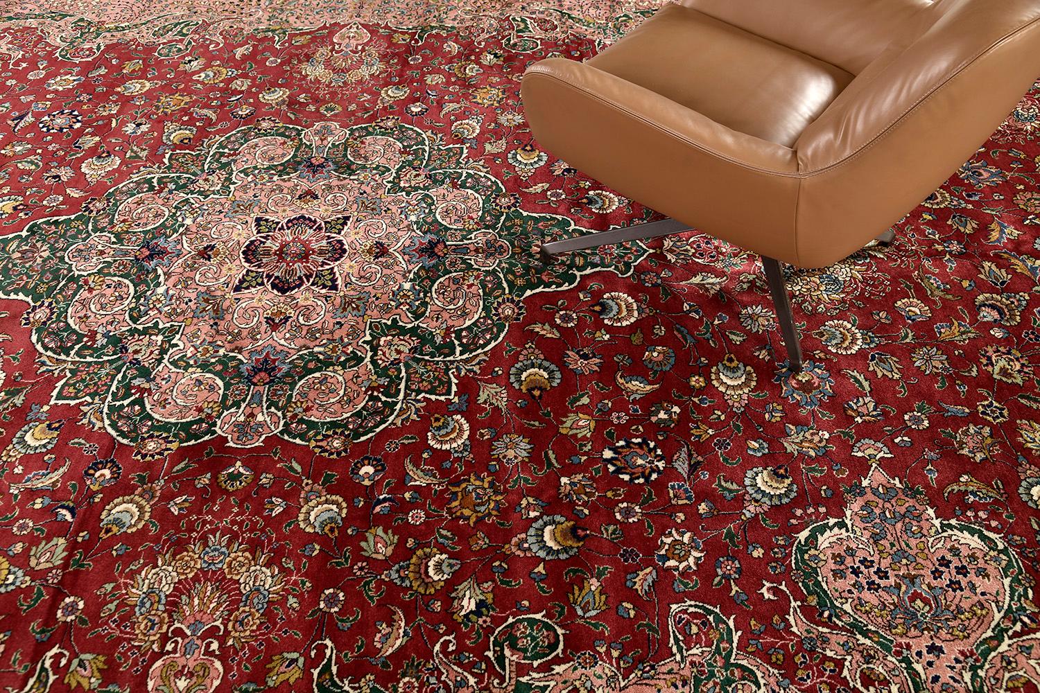 This meticulous hand-spun wool Tabriz rug features a neutral palette that makes this suitable for a whole host of applications. Series of embellishments in an allover design that matches the medallion and makes it looks more elegant. Use it for