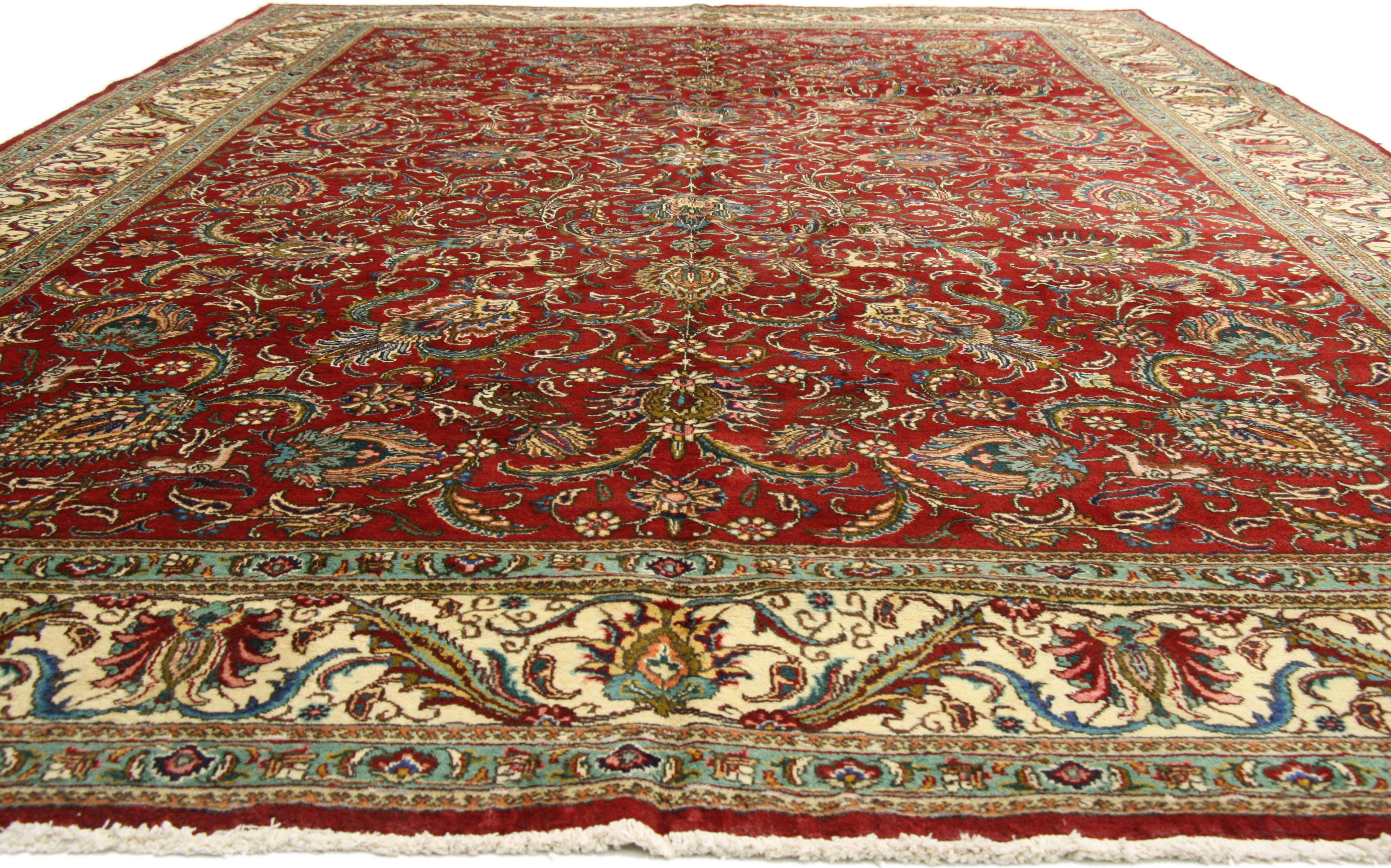 76352, vintage Persian Tabriz gallery rug with hunting scene and traditional medival style 11'03 x 16'01. This hand-knotted wool vintage Persian Tabriz gallery rug features an inconspicuous hunting scene composed of an all-over pattern composed of