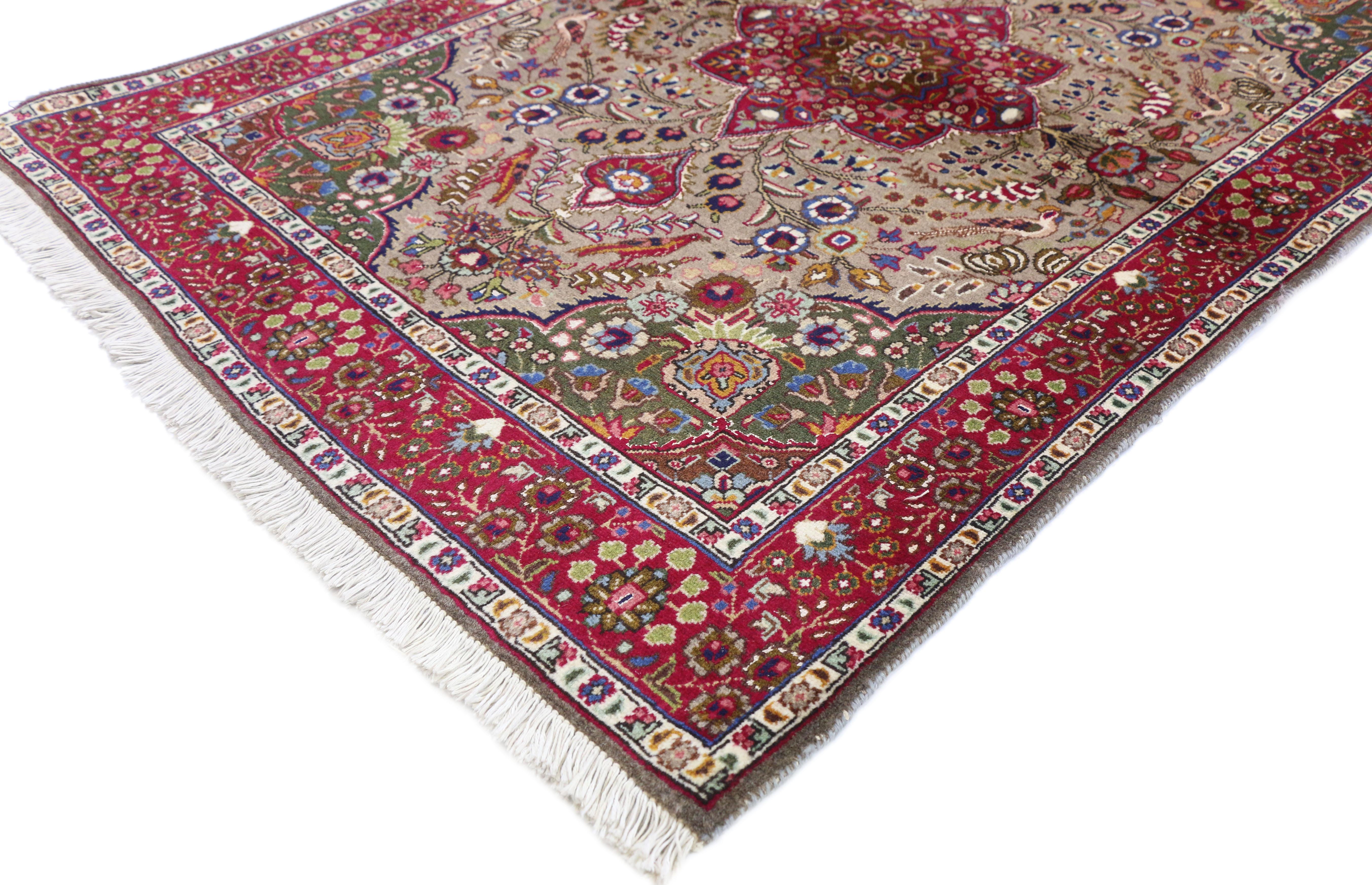 74690, Vintage Persian Tabriz Medallion Rug with Rustic Feminine Arts & Crafts Style. With a rustic feminine and Arts & Craft Style, this hand-knotted wool Persian Tabriz rug features a central red star medallion enhanced with geometric floral