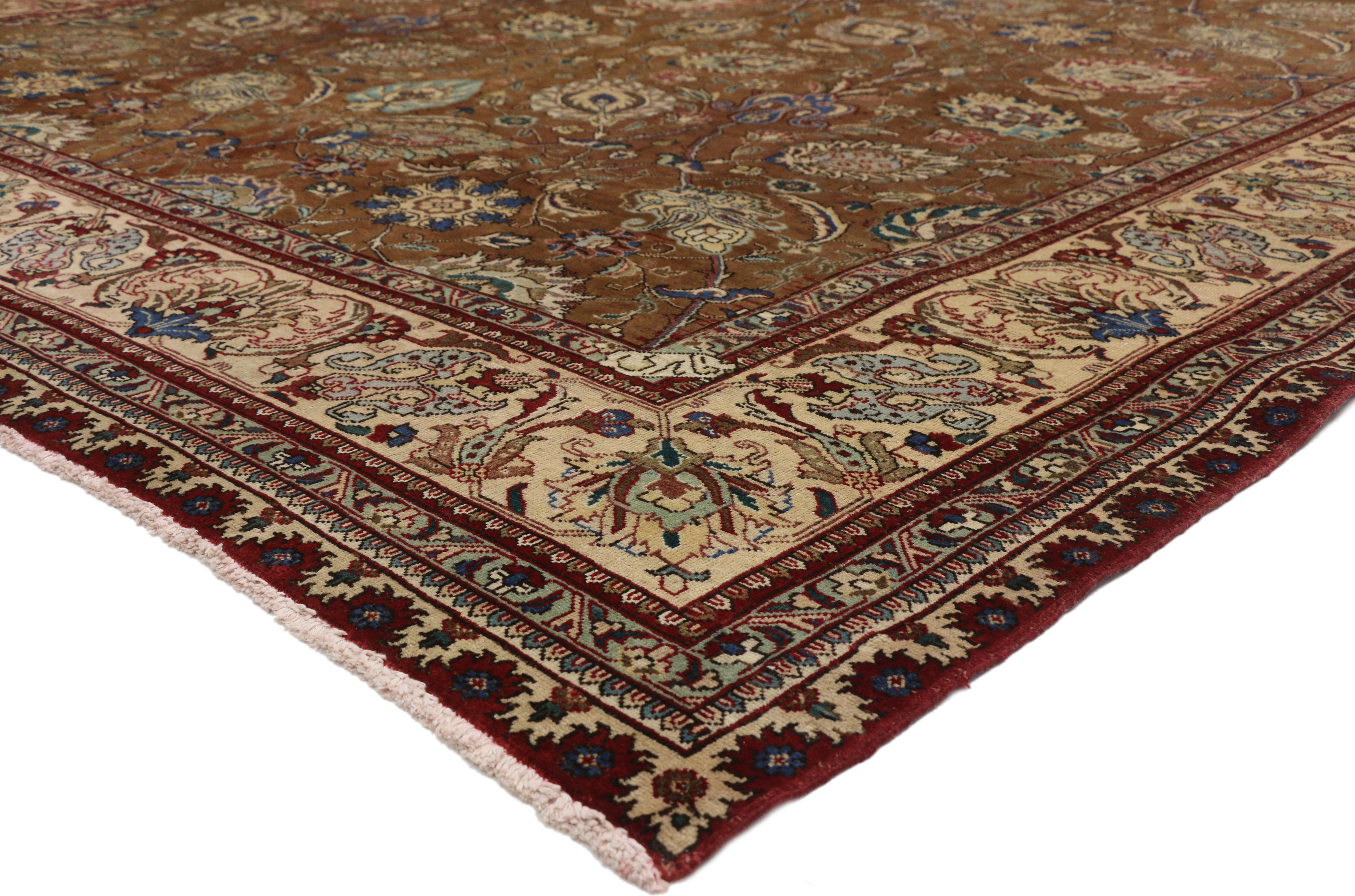 76347 Vintage Persian Tabriz Palace Rug with Arabesque Art Nouveau Style. This luxurious vintage Persian Tabriz palace rug features an arabesque Art Nouveau style and refined colors. With its intricate Shah Abbasi palmettes dancing gracefully with