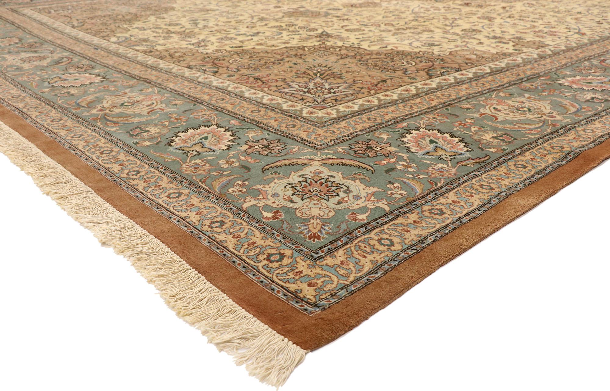 77499, vintage Persian Tabriz Palace rug with Dutch Renaissance Arabesque style. With ornate details and well-balanced symmetry combined with a dreamy color palette, this hand knotted wool vintage Persian Tabriz palace rug beautifully embodies both