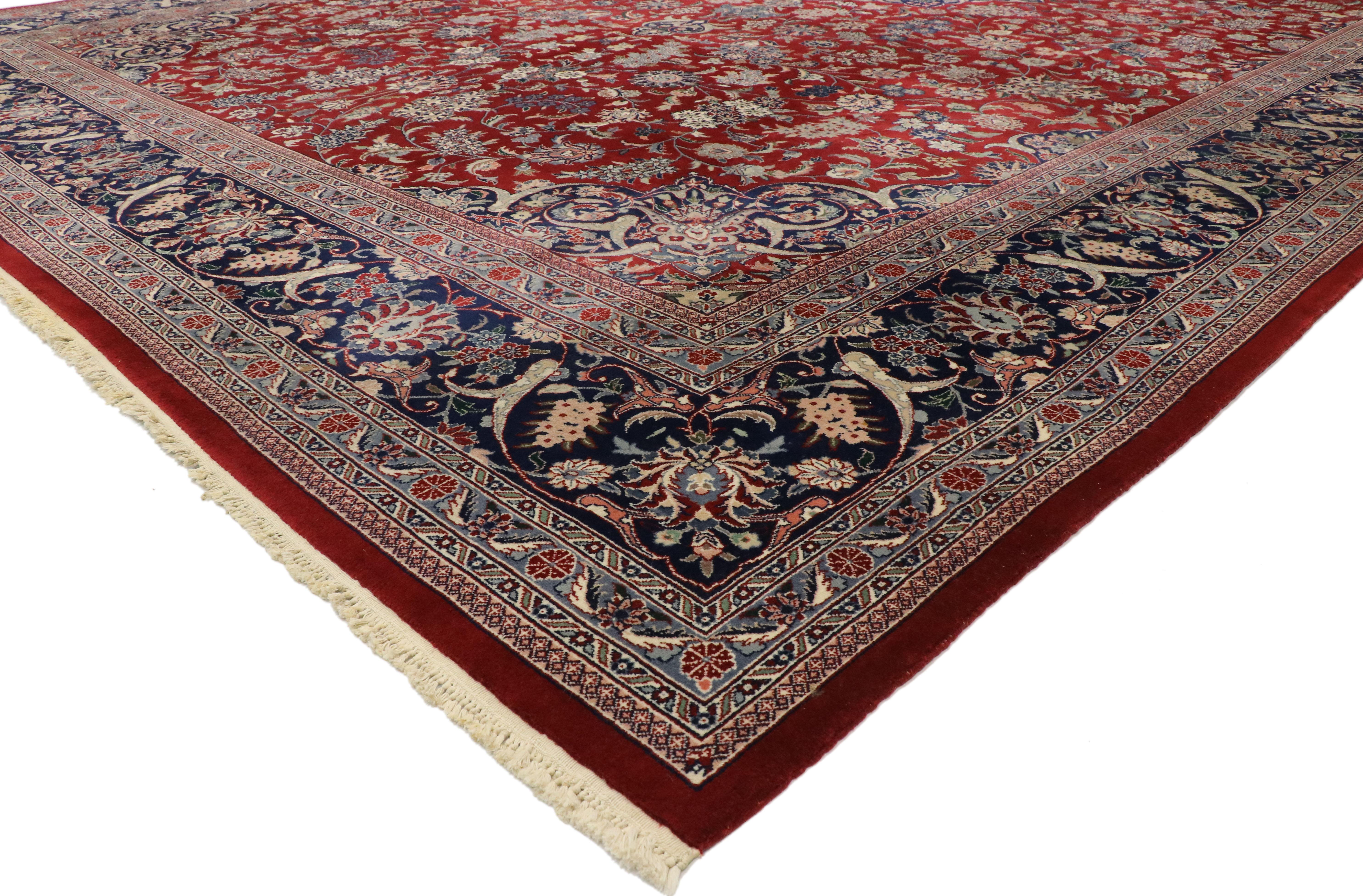 77415 Vintage Chinese Tabriz Rug, 11'11 x 17'11. With timeless appeal, ornate decorative detailing, and effortless beauty, this hand knotted wool vintage Chinese Tabriz palace rug is poised to impress. Taking center stage is a delicate navy blue