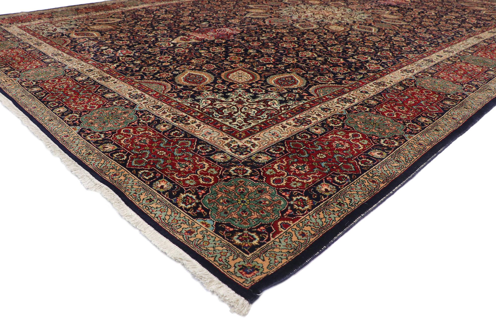 75664, vintage Persian Tabriz Palace size rug with The Ardabil Carpet design. Inspired from the Ardabil carpet from the Safavid dynasty. This hand-knotted wool vintage Persian Tabriz palace size rug features a circular 16-point centre medallion