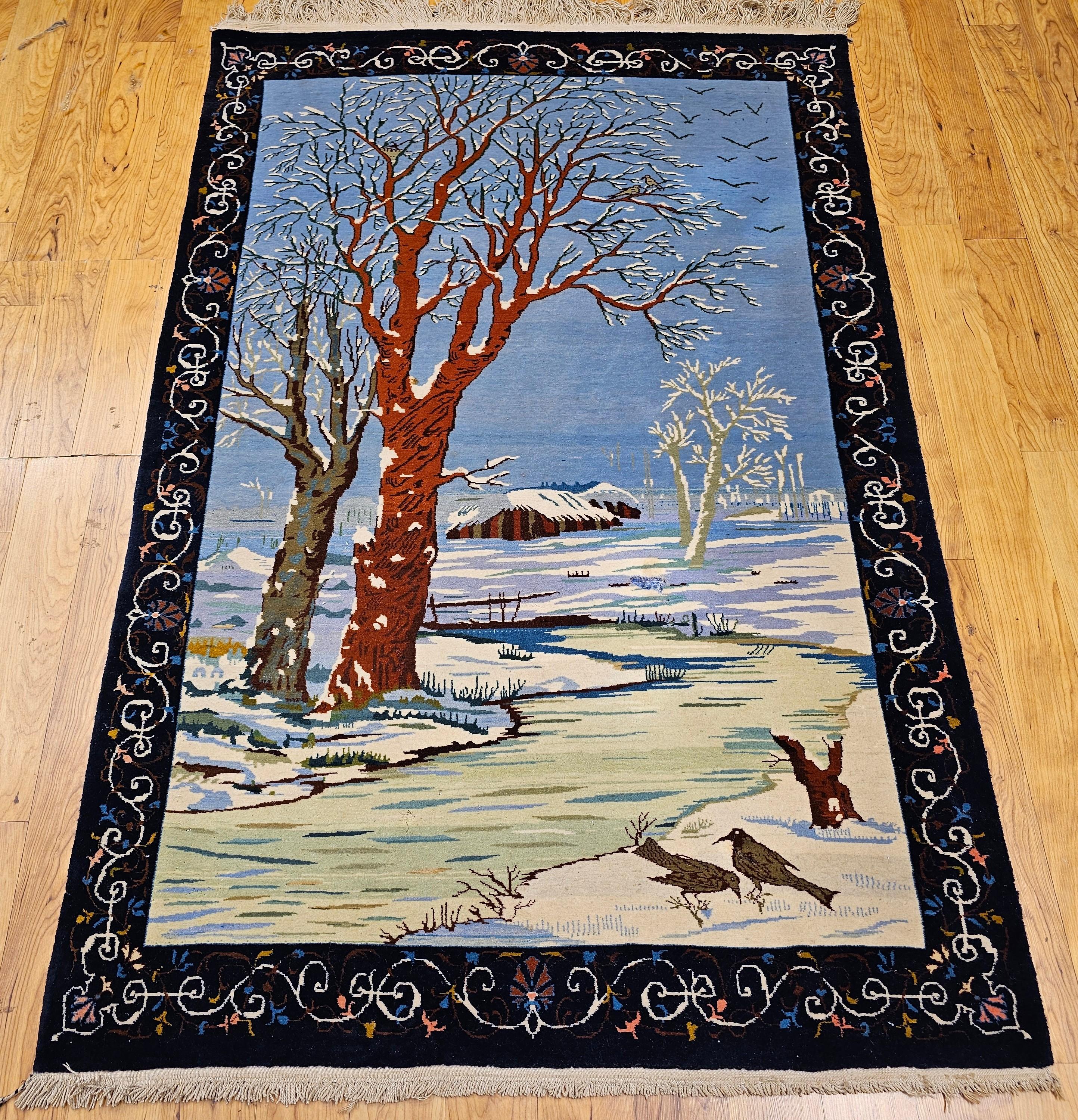 This vintage hand-knotted Persian Tabriz pictorial rug from the 3rd quarter of the 1900s is a stunning example of storytelling through weaving. Masterfully crafted, it captures a serene winter forest scene, complete with graceful trees, a frozen