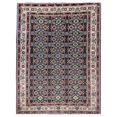 Alfombra persa Tabriz Vintage con diseño geométrico en azul marino y marfil