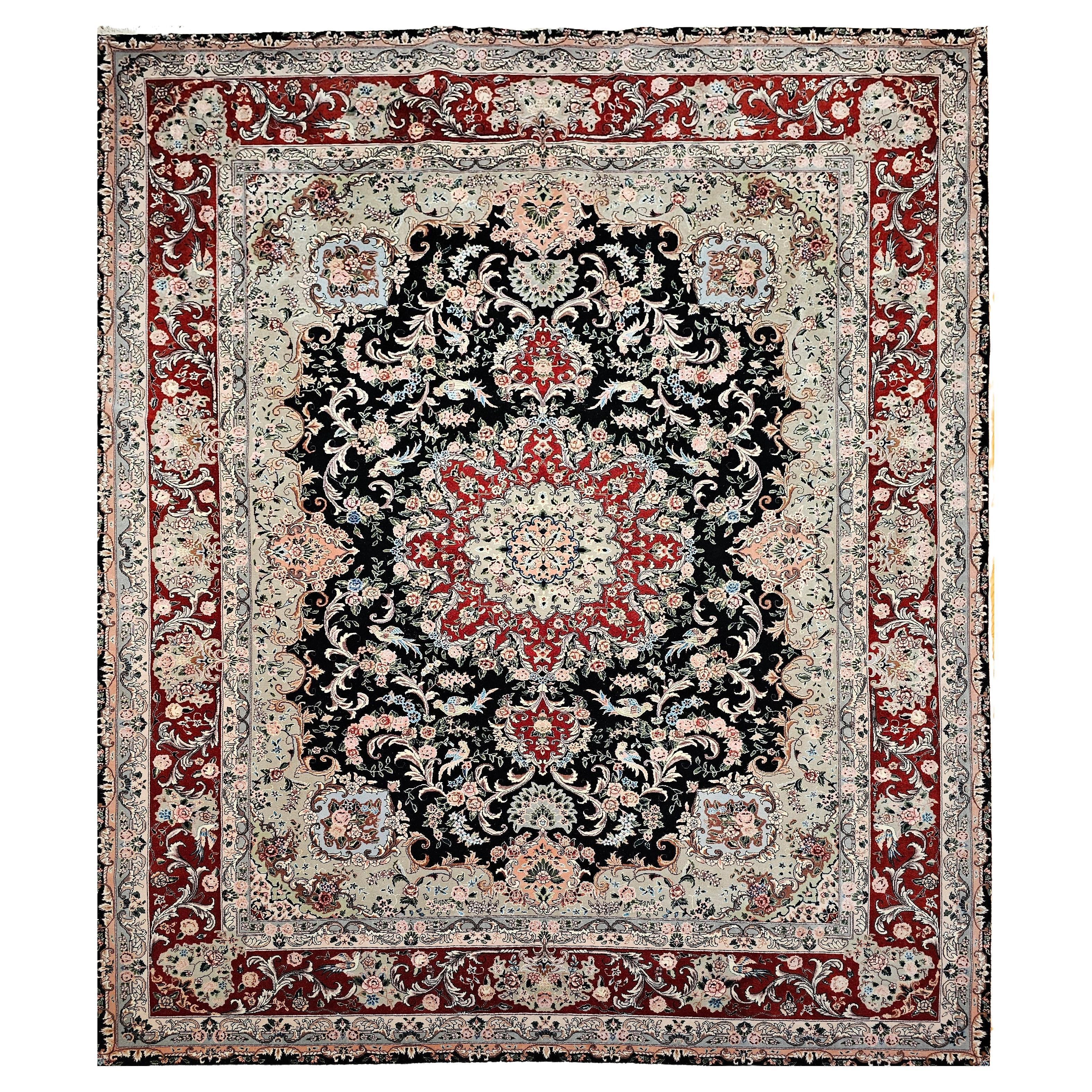 Tappeto persiano d'epoca Tabriz con motivo floreale in nero, rosso e verde