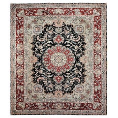 Tapis persan vintage Tabriz à motifs floraux en noir, rouge et vert