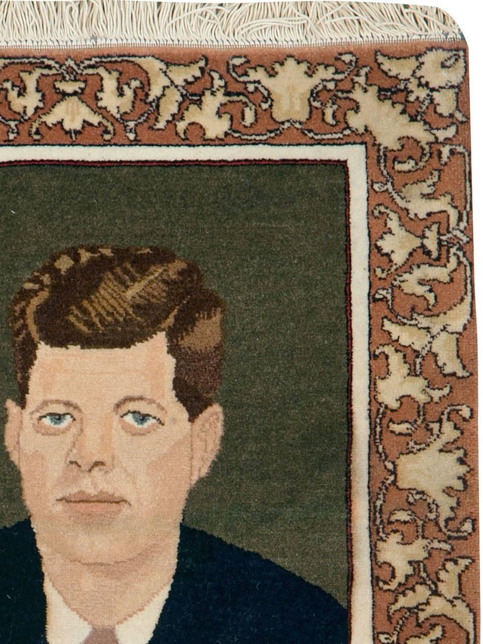 A vintage Persian Tabriz portrait rug handmade during the late 20th century with a pictorial depiction of John Fitzgerald Kennedy (JFK).

Measures: 1' 6