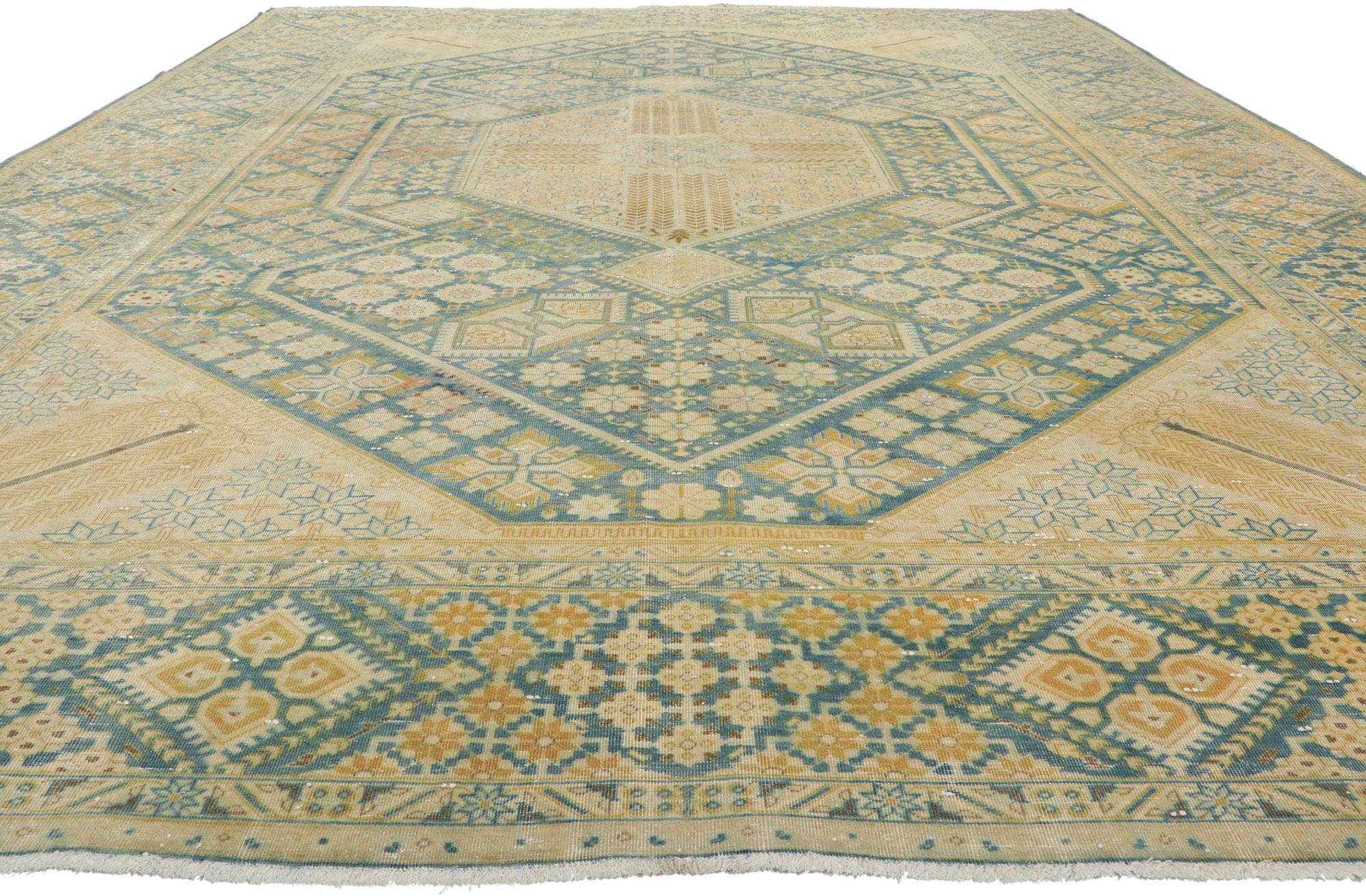 Hand-Knotted Vintage Persian Tabriz Rug with Faded Soft Colors For Sale