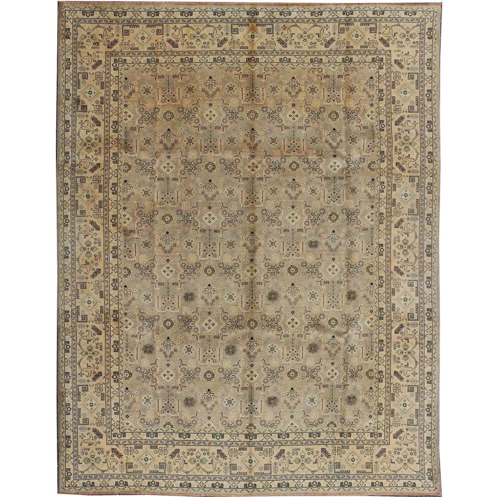 Vintage Persian Tabriz Rug with all over design in light colors For Sale