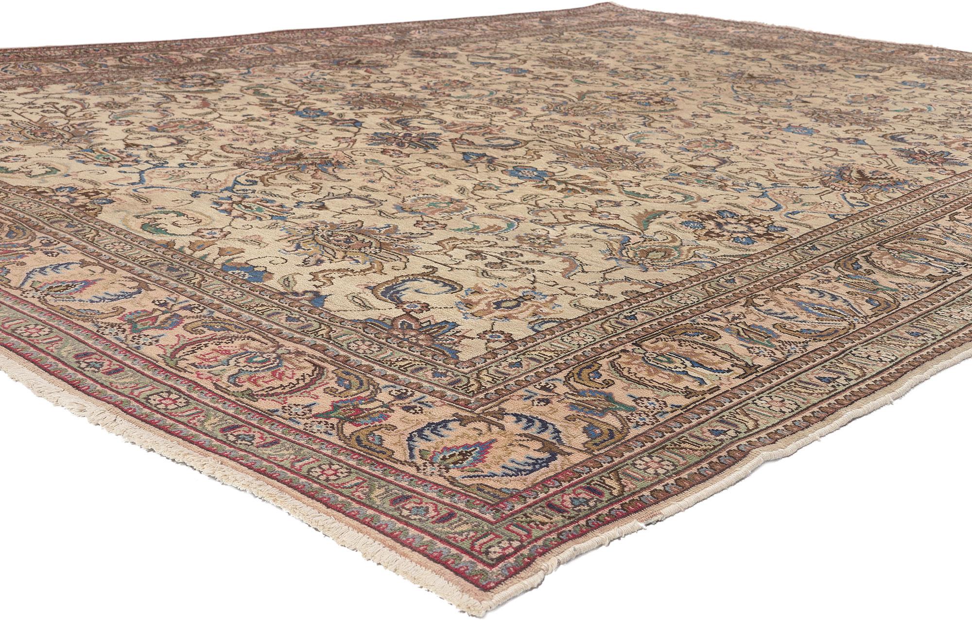 75093 Vintage Persian Tabriz Rug, 08'04 x 11'07.
French sophistication meets Neoclassic style in this hand knotted wool vintage Persian Tabriz rug. The naturalistic botanical design and light color palette woven into this piece work together