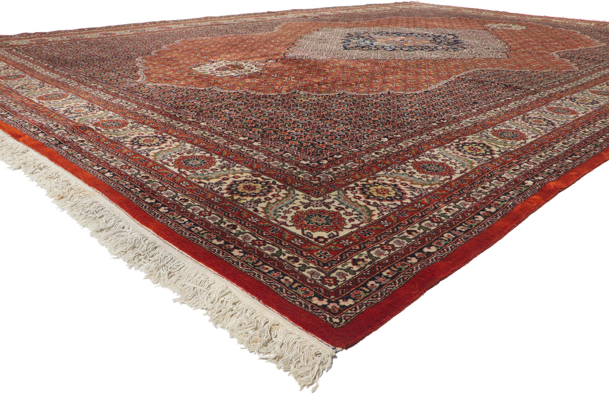 78414 Vintage Persian Tabriz rug, 11'11 x 17'08.
With ornate details and well-balanced symmetry, this hand-knotted wool vintage Persian Tabriz rug is poised to impress. Taking center stage is a concentric lobed medallion anchored with palmette