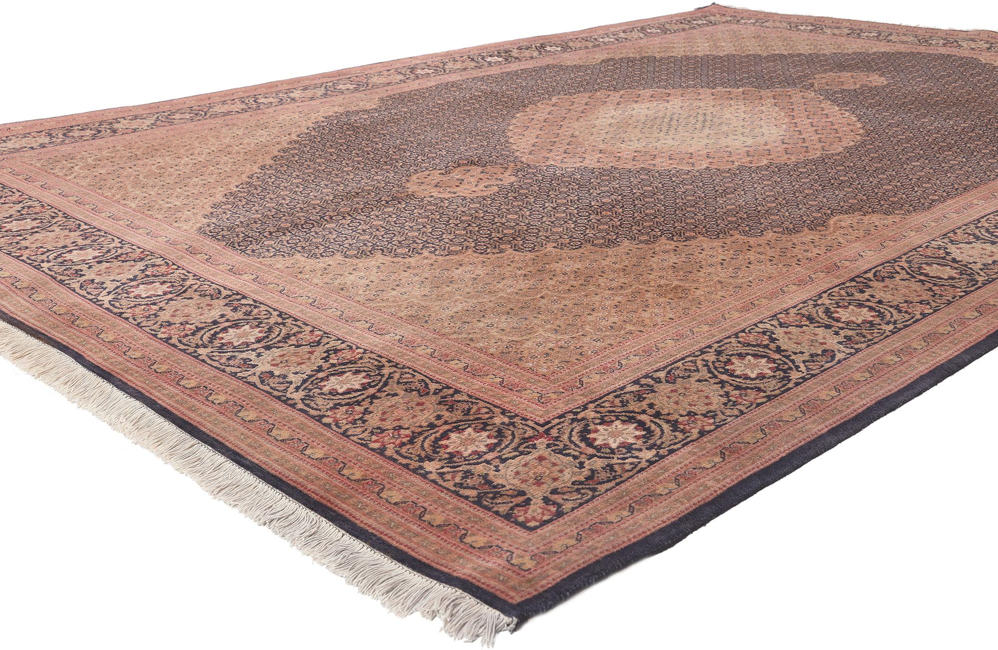 76981 Vintage Persian Tabriz Rug, 06'08 x 10'00.
Timeless elegance meets traditional sensibility in this hand knotted wool and silk vintage Persian Tabriz rug. The meticulously ornate details and regal color palette woven into this piece work