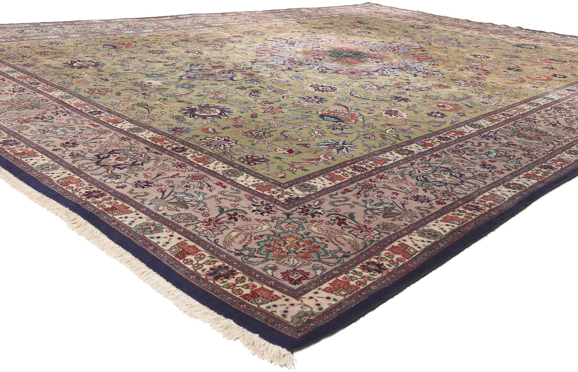 53864 Vintage Persian Tabriz Rug, 09'07 x 13'01.
Emanating traditional style with incredible detail and texture, this hand knotted wool vintage Persian Tabriz rug is a captivating vision of woven beauty. The timeless floral pattern and soft