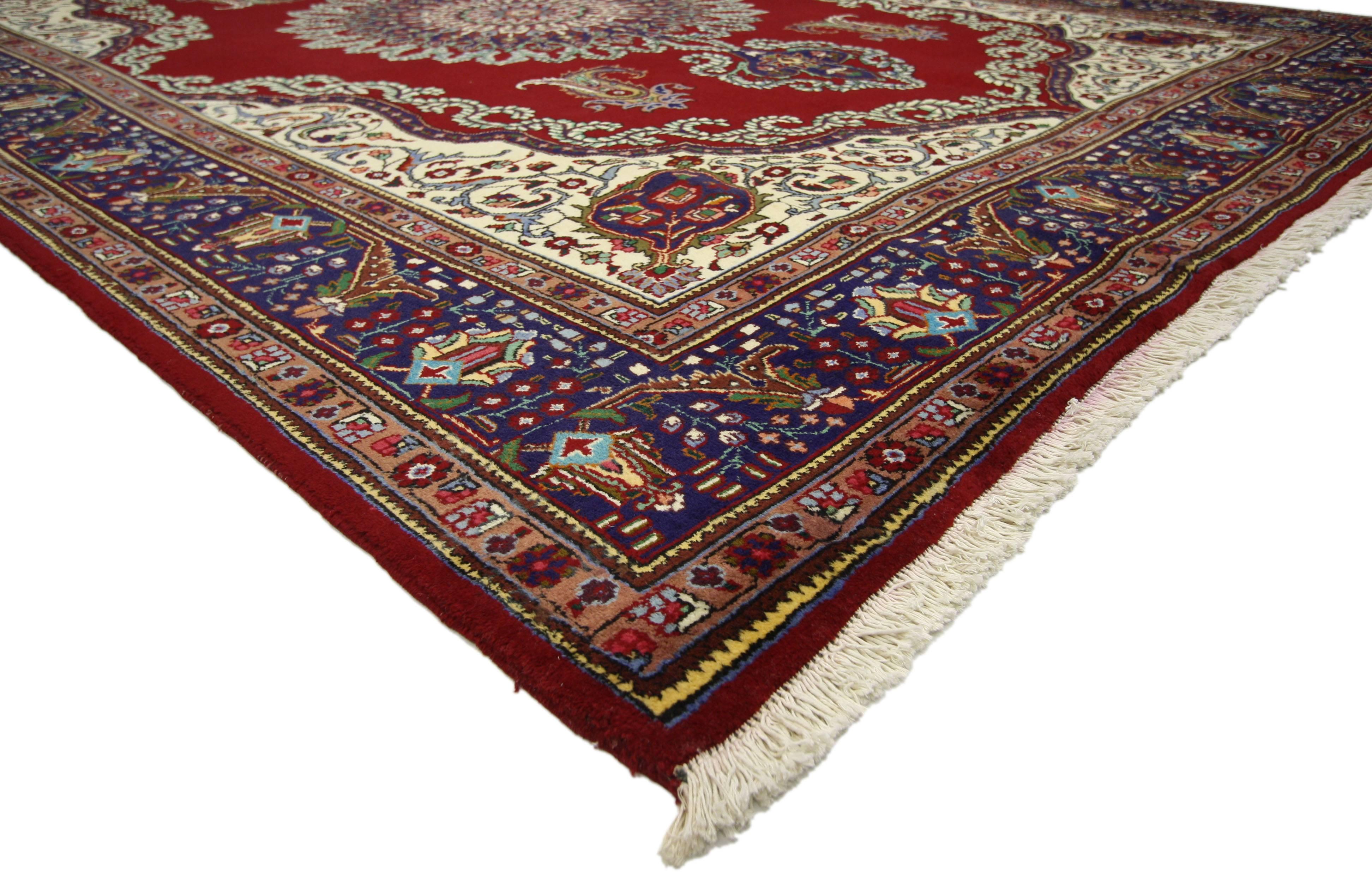 76485 Vintage Persian Tabriz Rug with Regal Jacobean Style 09'08 X 13'01. This hand-knotted wool vintage Persian Tabriz rug appears like a sumptuous Italian velvet, recalling the rich and luxurious design furnishings of a bygone era such as the