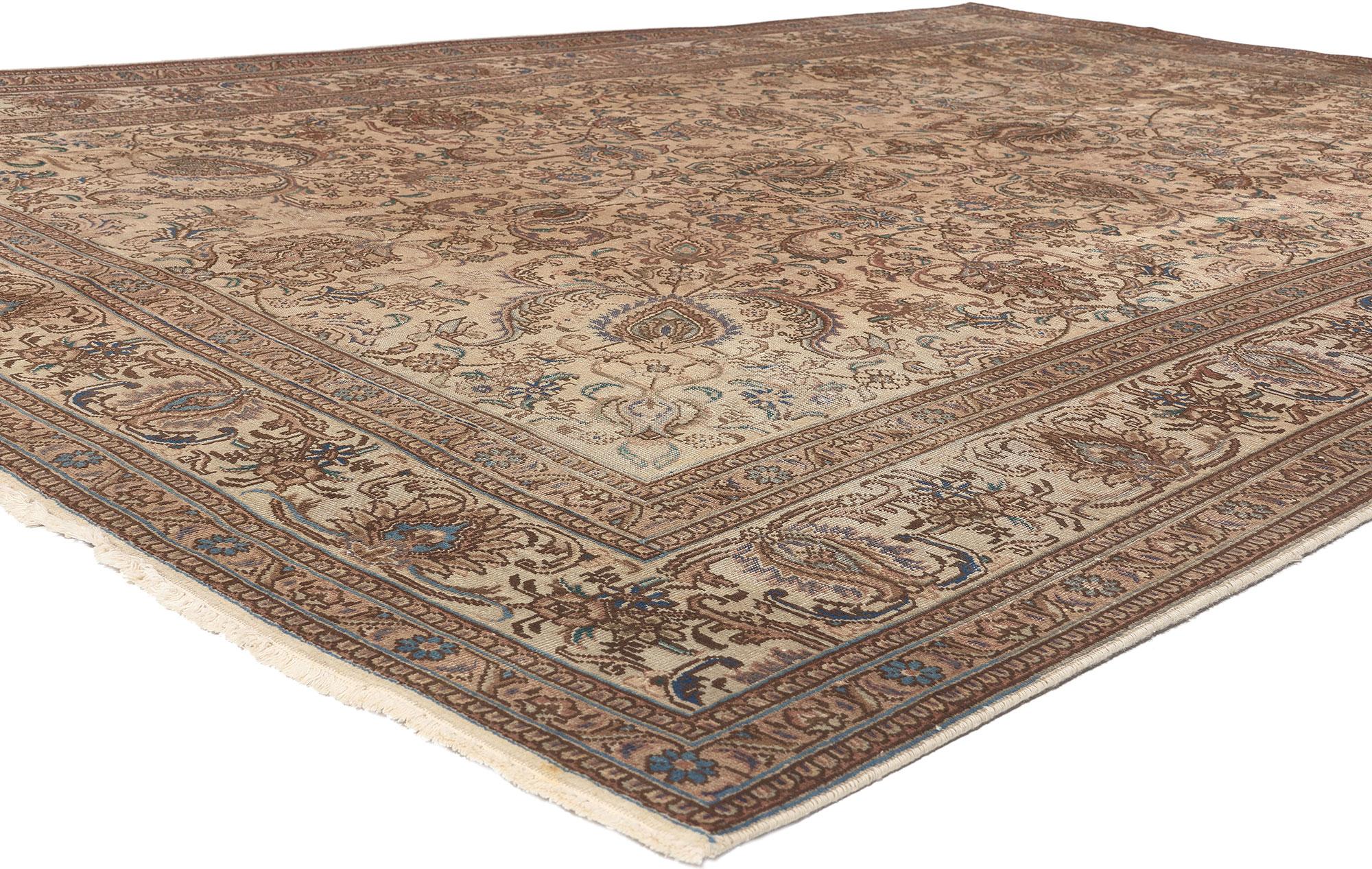 76734 Vintage Persian Tabriz Rug, 08'02 x 12'00. Colonial Revival meets Belgian Chic in this hand knotted wool vintage Persian Tabriz rug. The botanical design elements and neutral earth-tone colors in this piece emulates the timeless design and