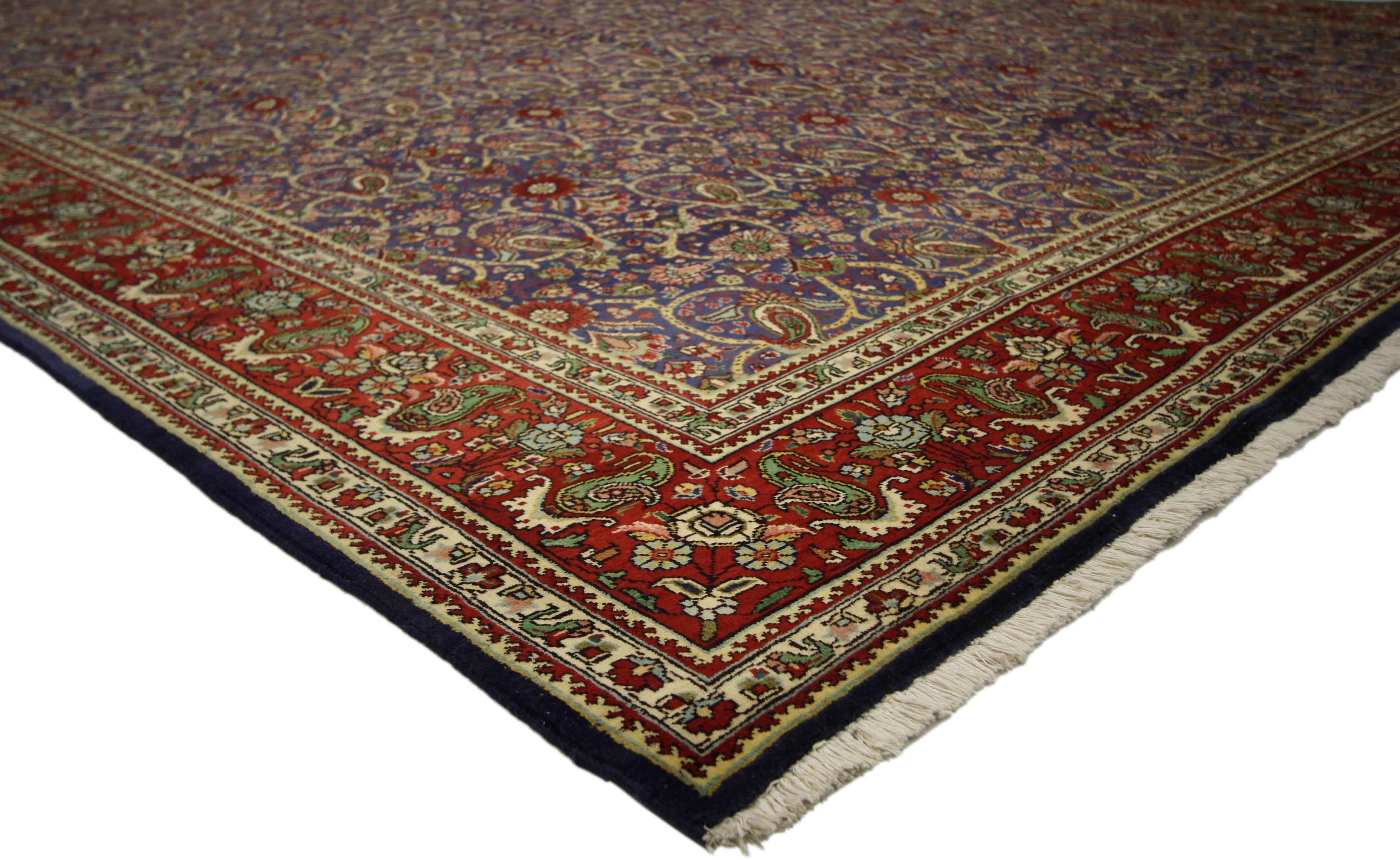 76331, Vintage Persian Tabriz rug with traditional style. This hand-knotted wool vintage Persian Tabriz rug features an all-over pattern surrounded by a classic border creating a well-balanced and timeless design. This vintage Persian Tabriz rug