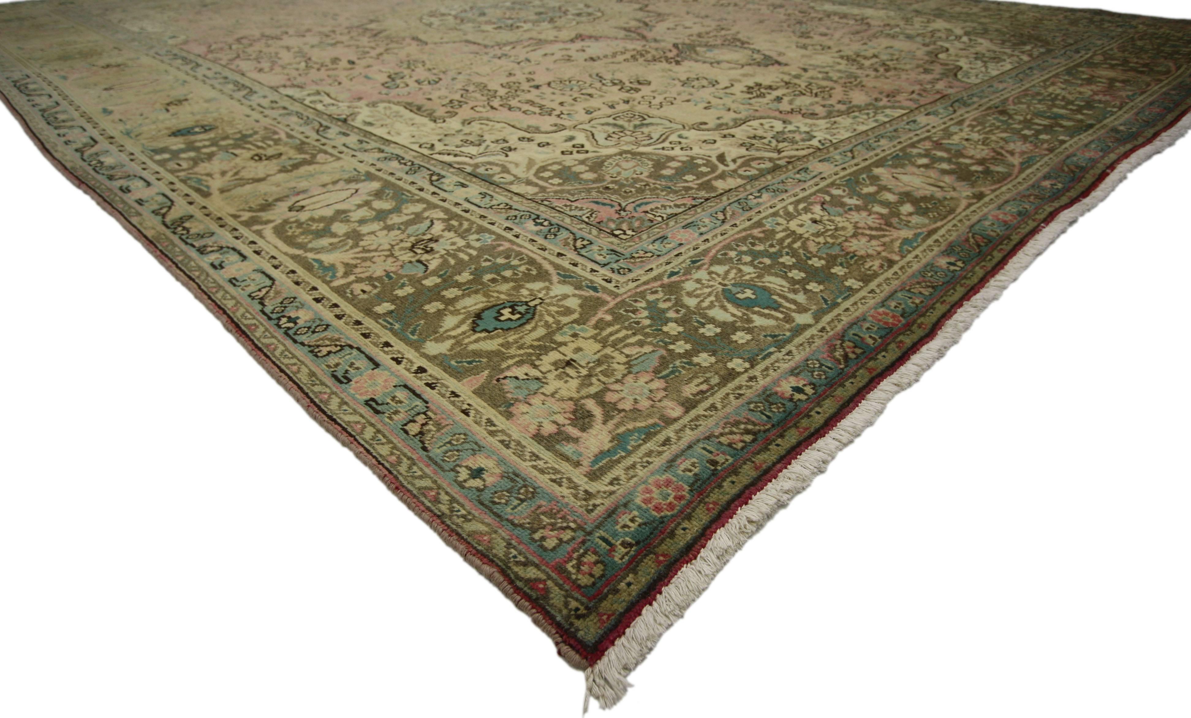 76446, vintage Persian Tabriz rug with traditional style. This hand-knotted wool vintage Persian Tabriz rug features a centre medallion with an all-over pattern surrounded by a Classic border creating a well-balanced and timeless design. This